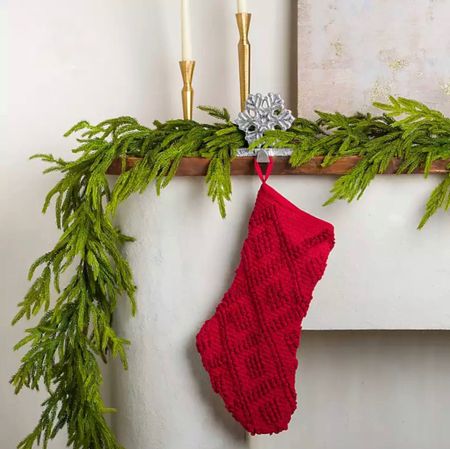 This Norfolk pine garland is on sale right now! I just bought three strands to complete my Christmas mantle decoration

#LTKHoliday #LTKSeasonal #LTKHolidaySale