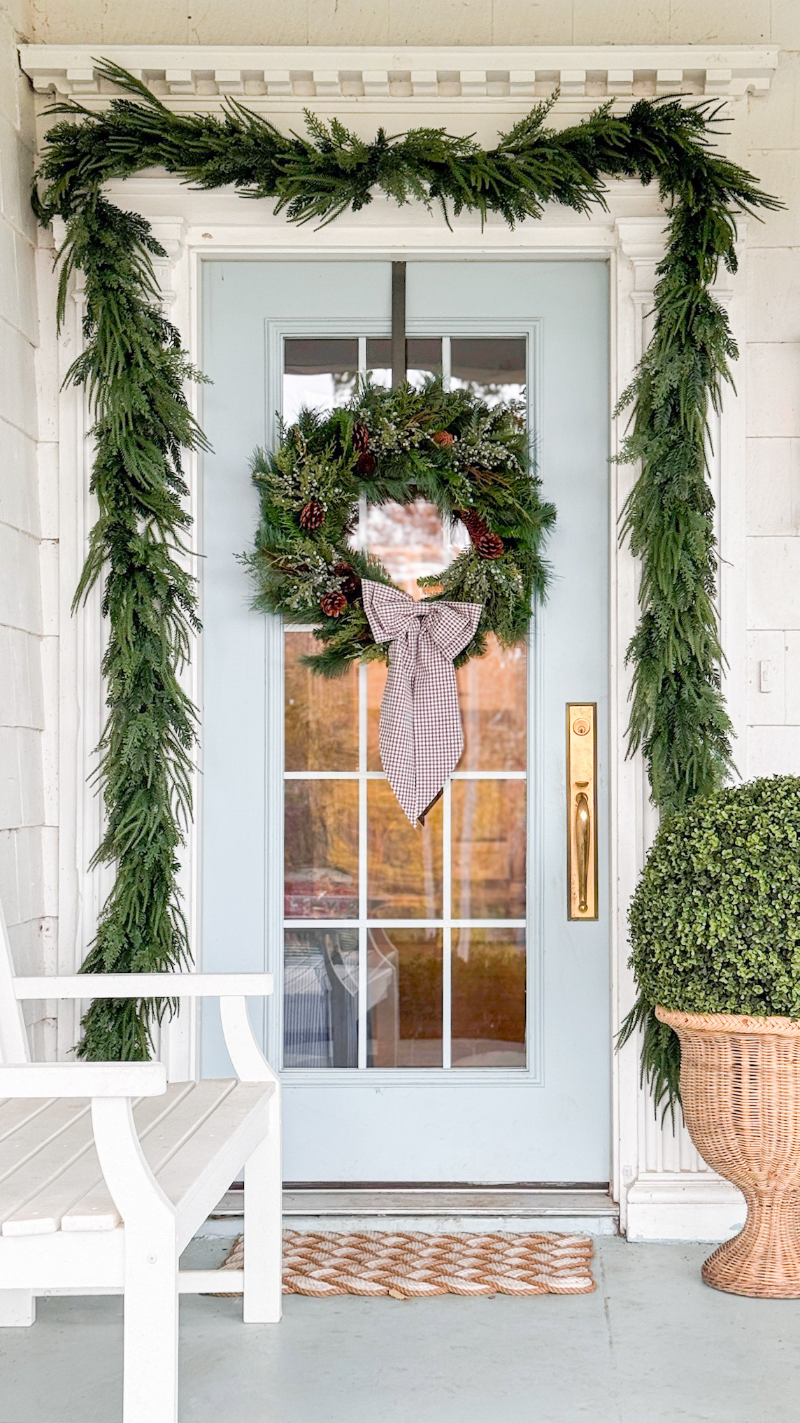 November Fall Door  
Outfit: Madewell barrel jeans, gingham top, belt.  

Garland from Amazon, gingham bow is sold out but linked other similar options! 

 

#LTKHoliday