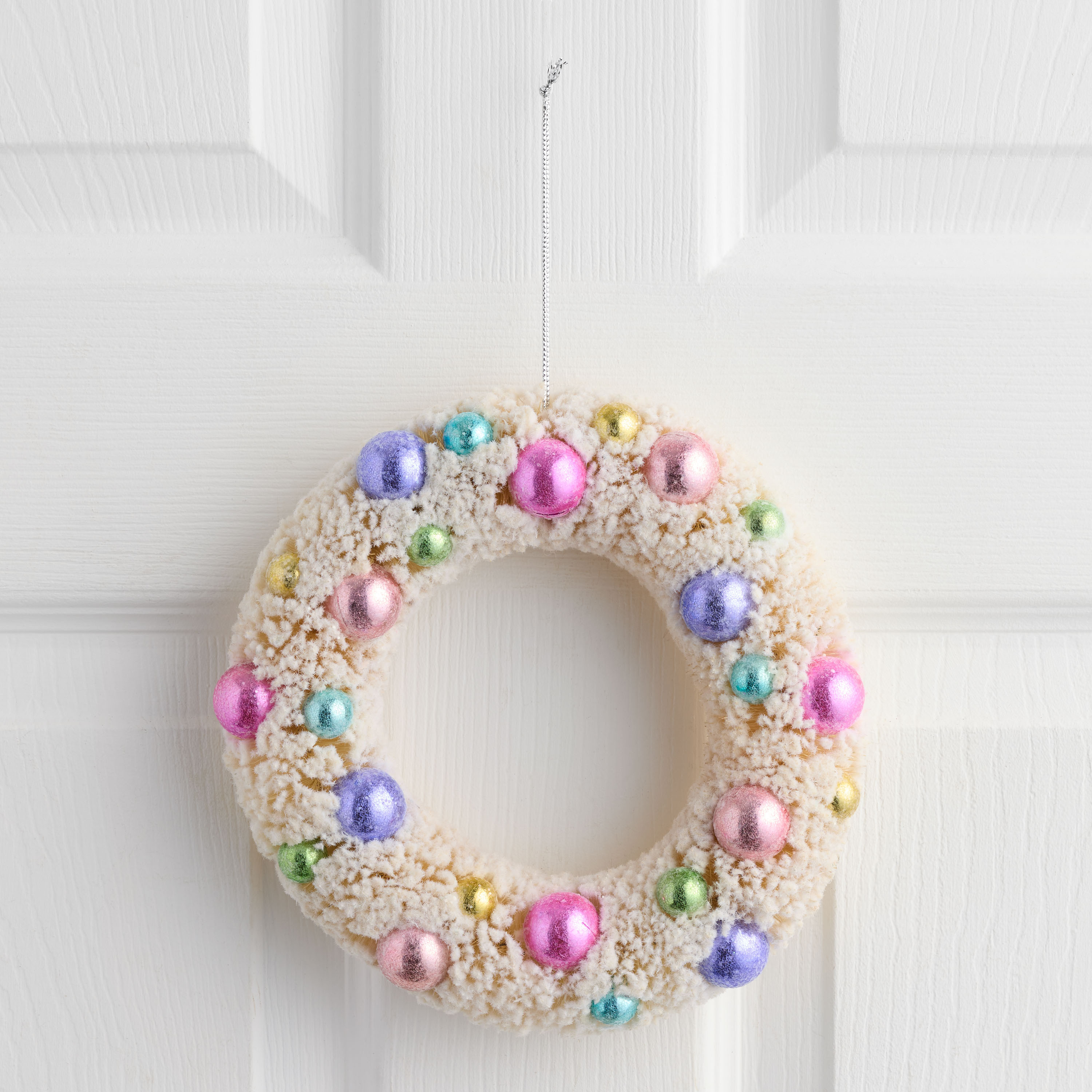 White Retro Flocked Bottlebrush Wreath | World Market