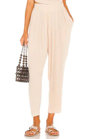 Indah Tanah Solid 80s Pleated Trouser in Doe from Revolve.com | Revolve Clothing (Global)