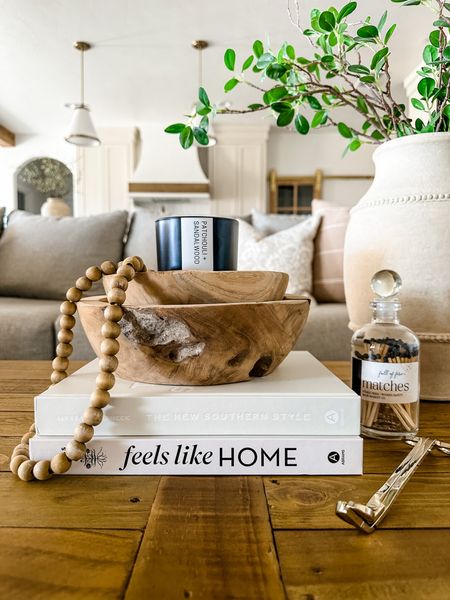 Coffee table styling
Neutral home decor
Cozy home
Coffee table books
Candle
Wick trimmer
Teakwood bowls
Decorative bowls
Matches
Small shop
Small business 

#LTKFind #LTKhome