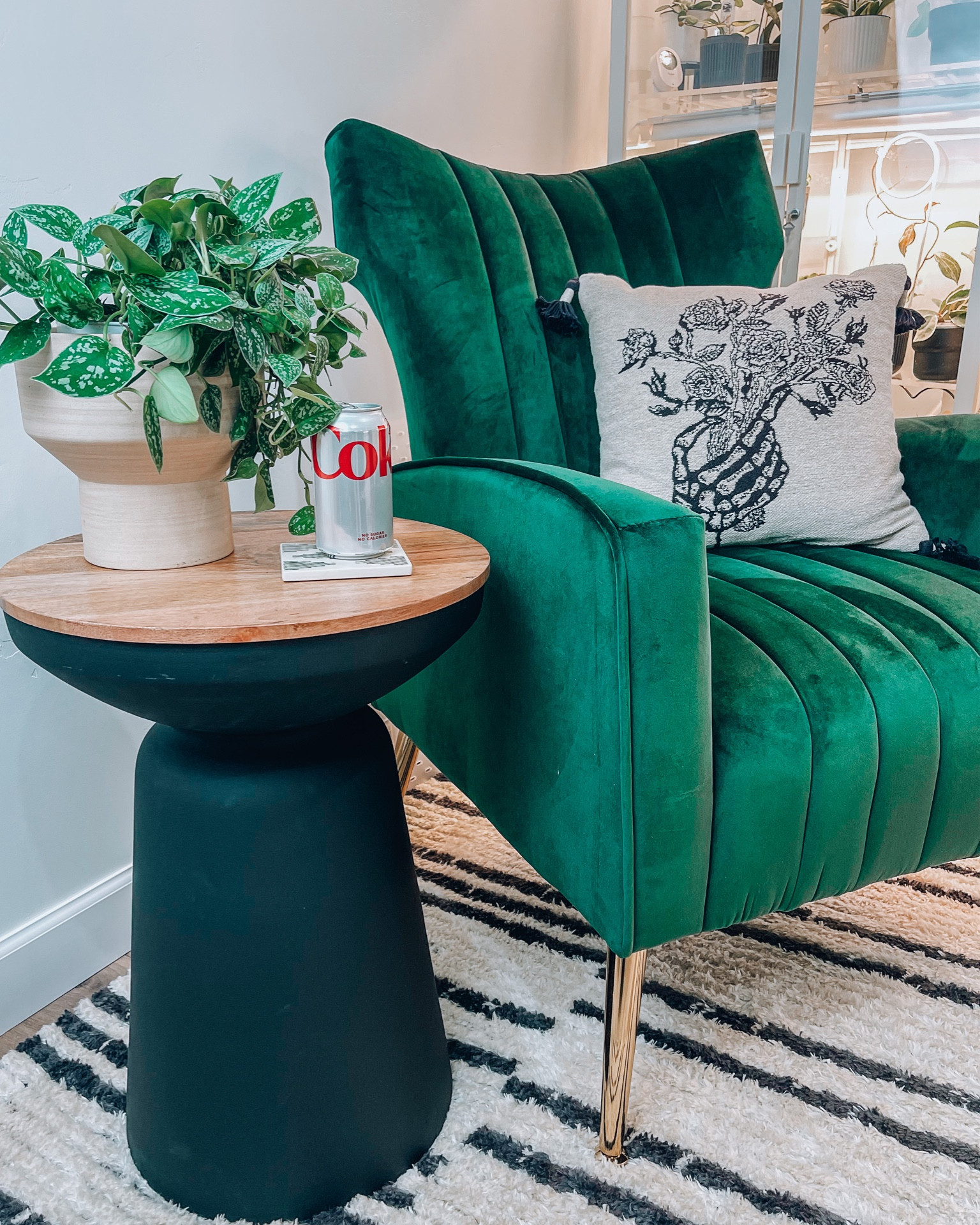 Green velvet accent chair- Halloween pillow- black end table - coasters 

#LTKhome #LTKsalealert #LTKstyletip