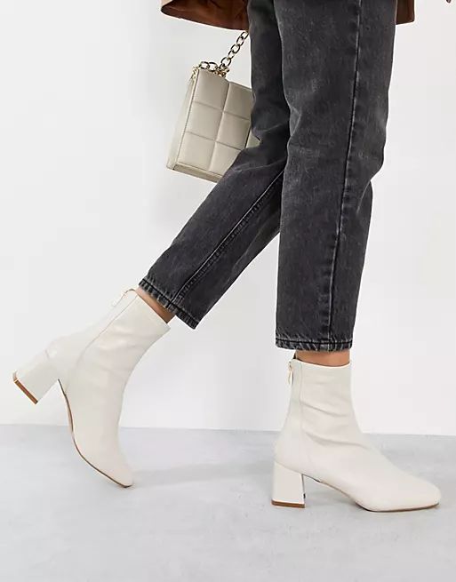RAID Maddy mid heel sock boots in cream | ASOS (Global)