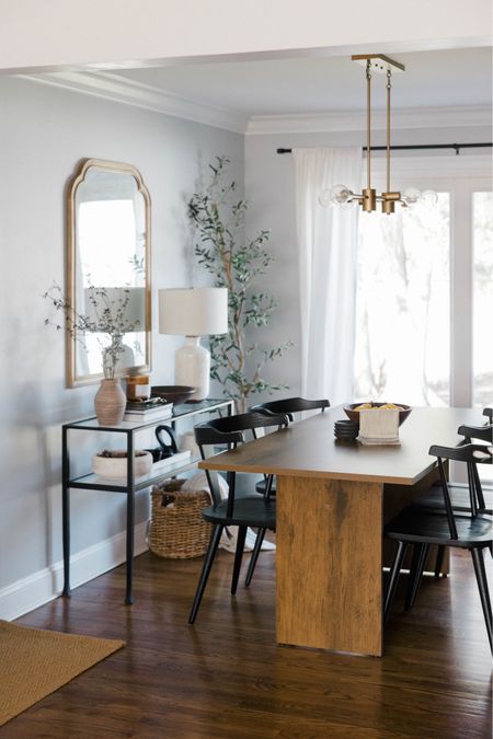 This faux-wood dining table is such an amazing deal for the quality — I still can’t believe it’s under $300, such a steal! I love the grain detail and clean lines. These beautiful Poly & Bark dining chairs are an exact dupe for the Pottery Barn version, and help keep the space feeling warm and modern.

#LTKhome