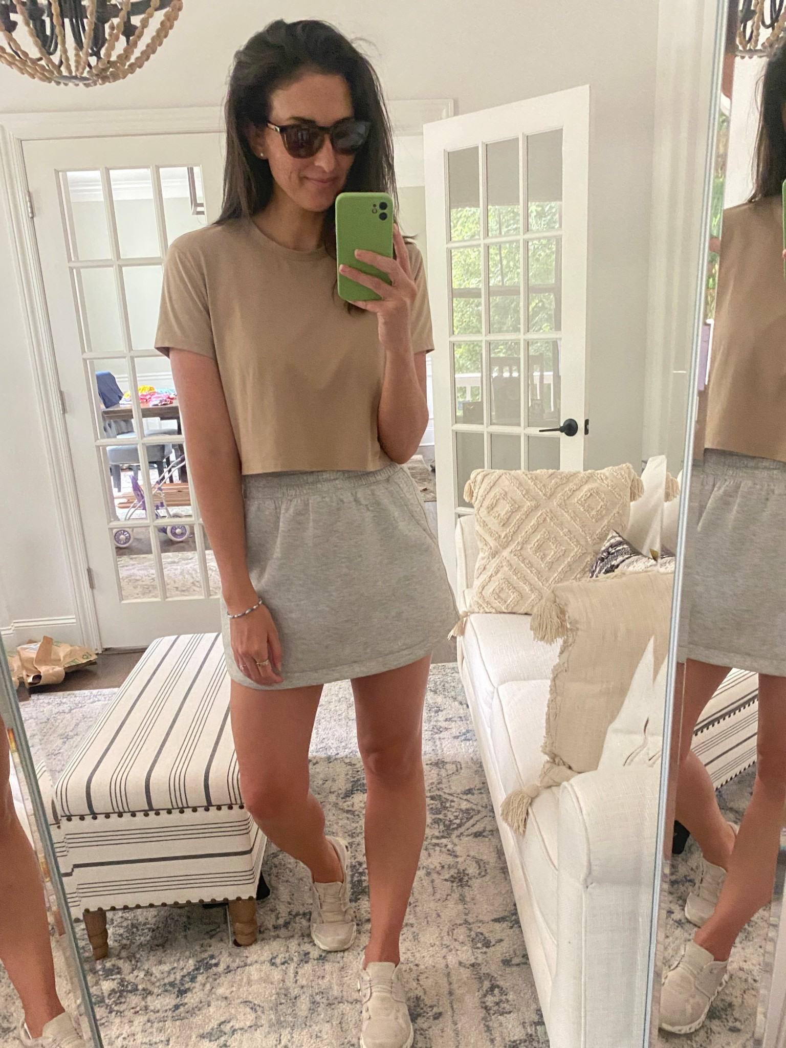 Saturday morning outfit. Love this sweats style skirt from Abercrombie, wearing a medium. This is the almost Friday cropped tee from cuts. This color is sold out but available in black and white. Paired with my go to on clouds and Oakley sunglasses 

#LTKFindsUnder50 #LTKFindsUnder100 #LTKSaleAlert