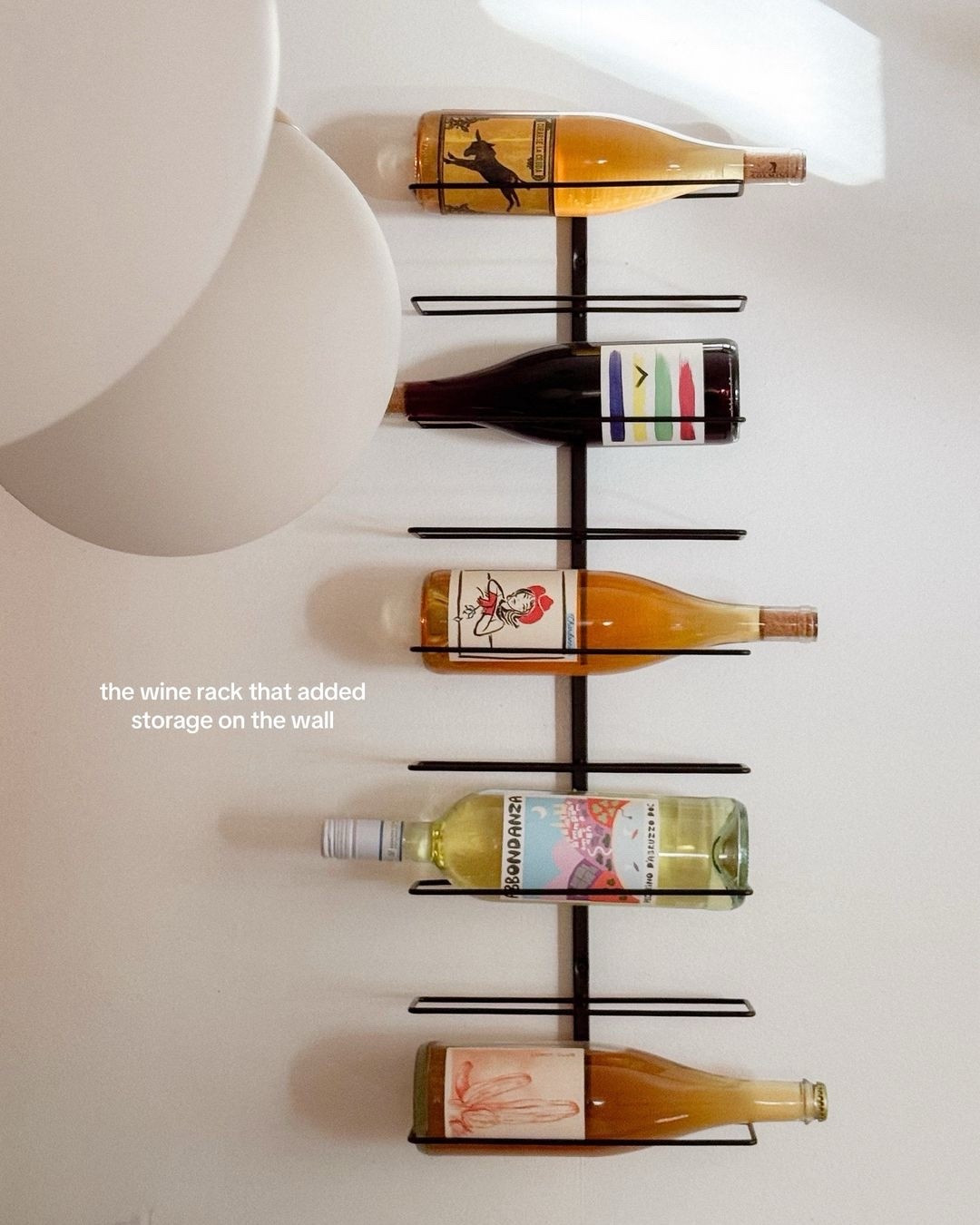 Recent apartment additions / this cutie wine rack 

#LTKHome