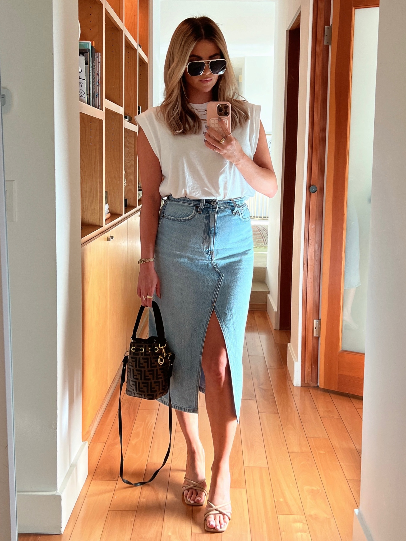 Skirt runs slightly big- wearing my normal size 26 
Tank is sold out so linked my favorite white tee I wore with it last time. Shoes are on sale for $34! And so comfy. TTS