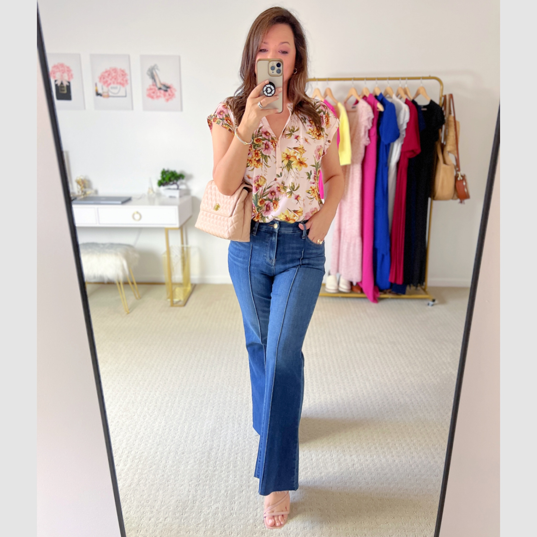 This pink floral top and pintuck flare jeans are now on sale for 40% off! 🎉

#LTKsalealert #LTKover40 #LTKmidsize