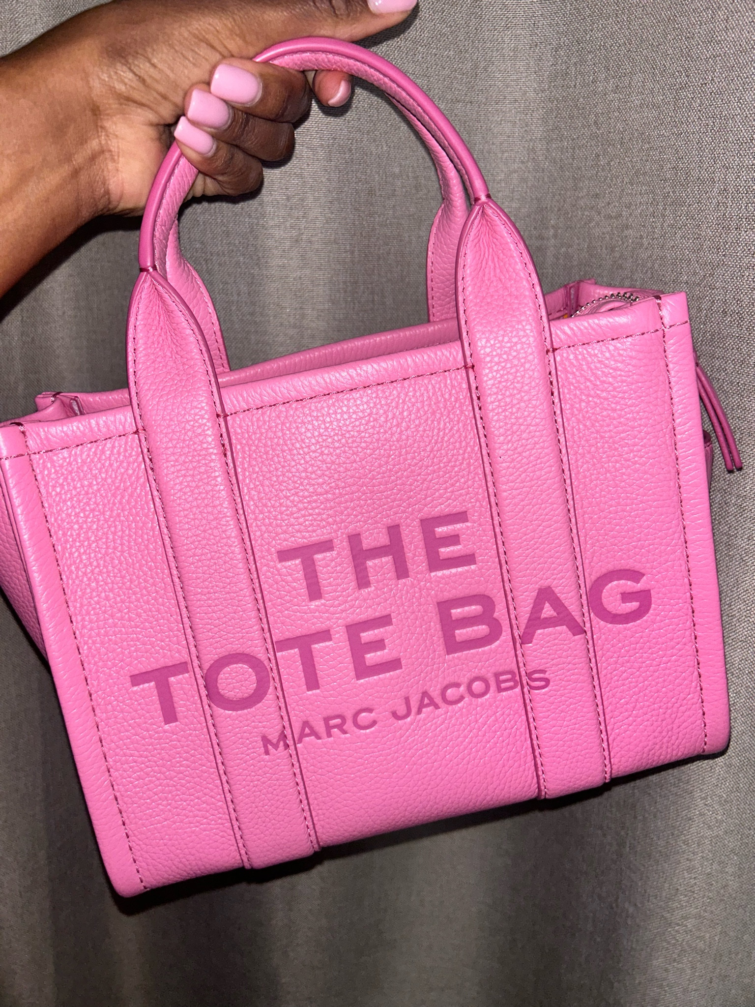 Current work bag is this fun pink Marc Jacobs The Leather Mini Tote Bag. 

Fall fashion
Fall outfits
Pink handbag
Crossbody bag
Should bag
Top handle bag

#LTKitbag #LTKSeasonal