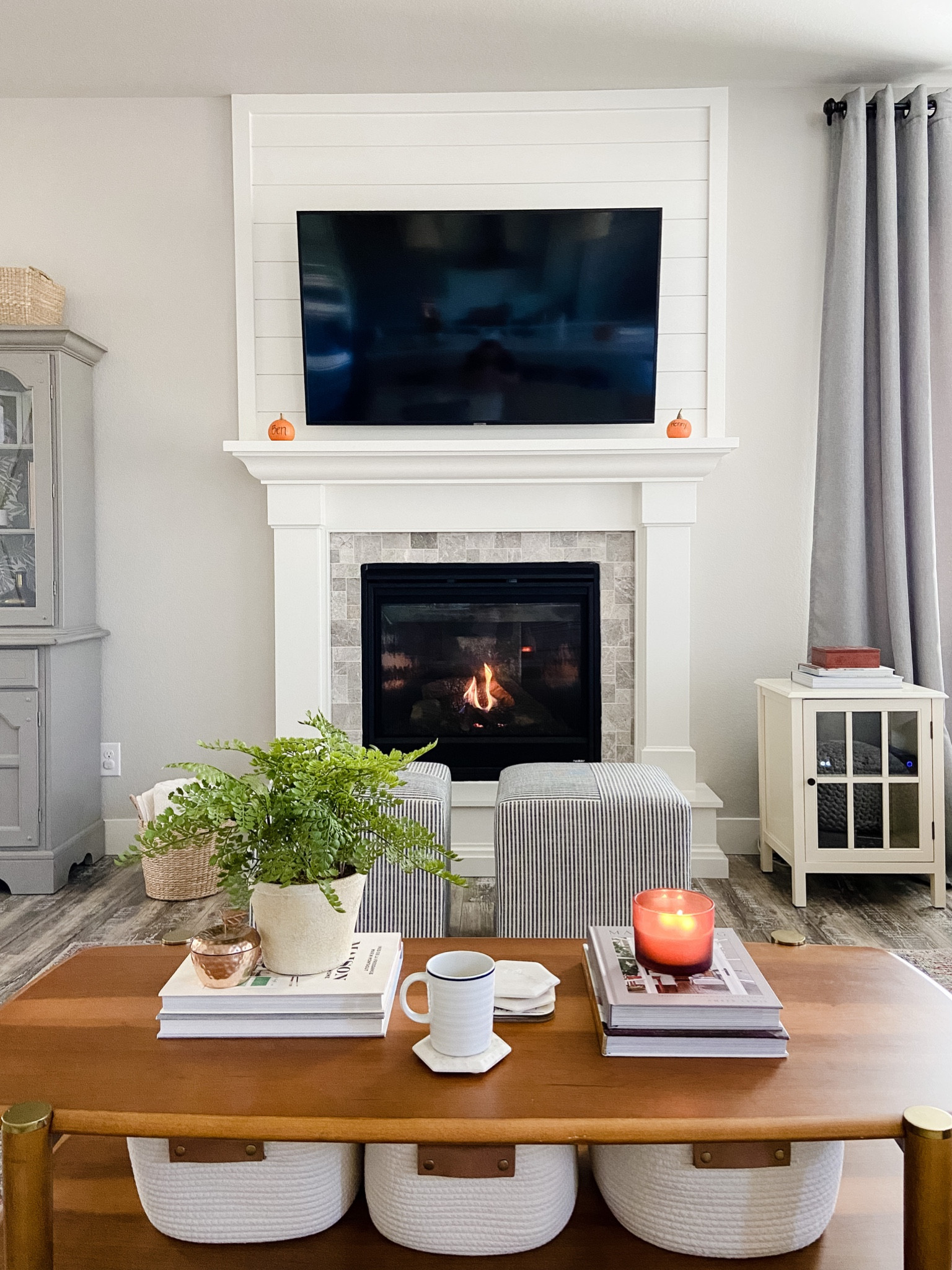 First morning with the fire on calls for coffee with the ceremonial lighting of the first fall candle of the season! 🍂☕️🕯
#fireplacedecor #livingroom #coffeetabledecor #coffeetablestyling #homedecor #fallfeels 

#LTKhome #LTKSeasonal