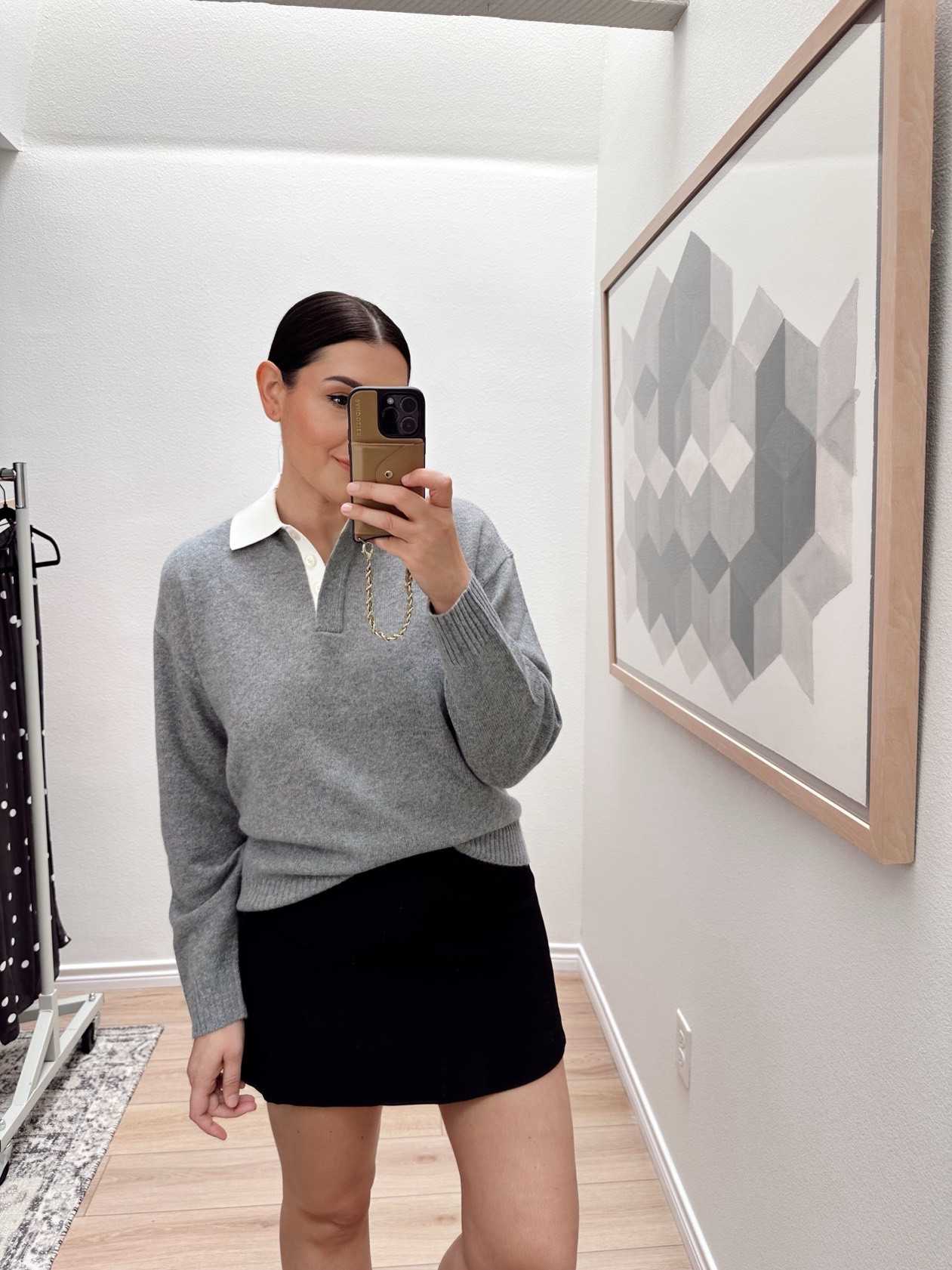 I'm in the medium of the relaxed polo -- it fits loose! 100% cashmere -- so luxe!

I'm in the large of the skirt.  

 