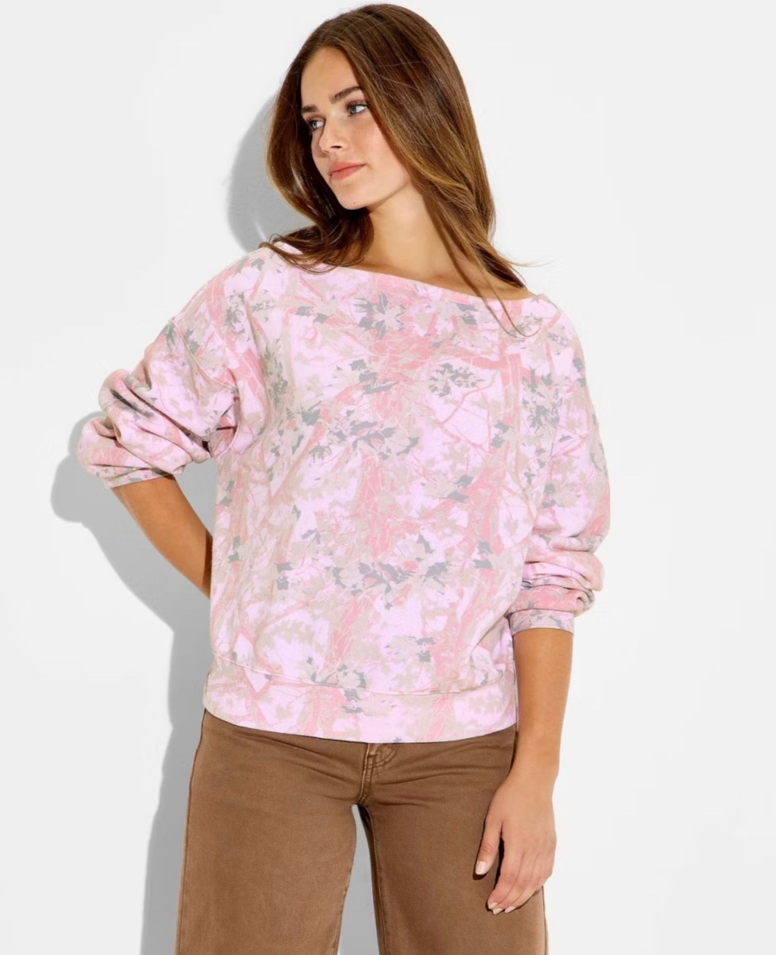 Part of a matching set! Super cute viral pink camo sweatshirt that has matching flare sweatpants! Super cozy ,and comes in plus sizes as well! 

#LTKPlusSize #LTKTravel #LTKBump