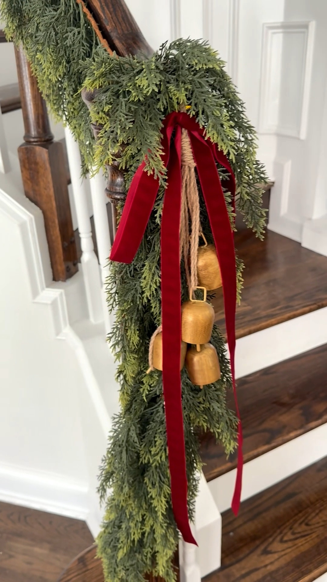 The prettiest garland this season 🎄paired with a velvet burgundy bow and gold bells 🔔 ✨ It looks so beautiful down the stairs!

#LTKHoliday #LTKHome #LTKSeasonal