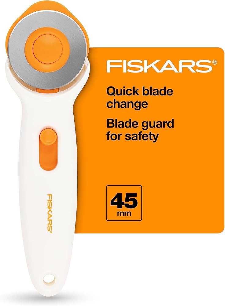 Fiskars 45mm Rotary Cutter for Fabric, Premium Steel Stick Fabric Cutter Cuts Through Multiple La... | Amazon (US)