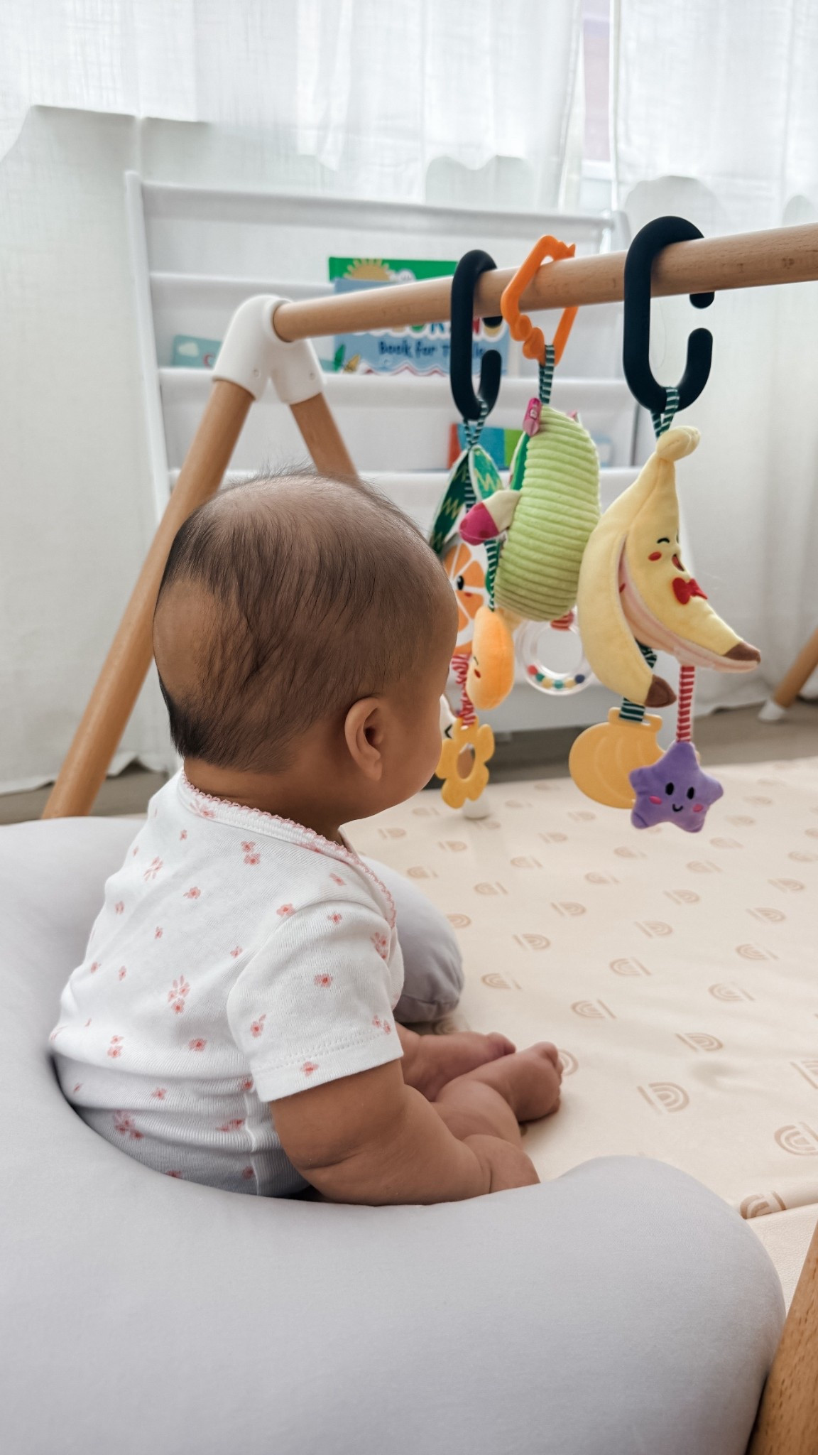 Sitting up practice for my five month old! She loves these fruit and veggie hanging toys which help encourage her to sit up and also eventually should start grabbing at them #BabyToys #ToddlerToys #Motherhood #Toys

#LTKKids #LTKBaby #LTKHome