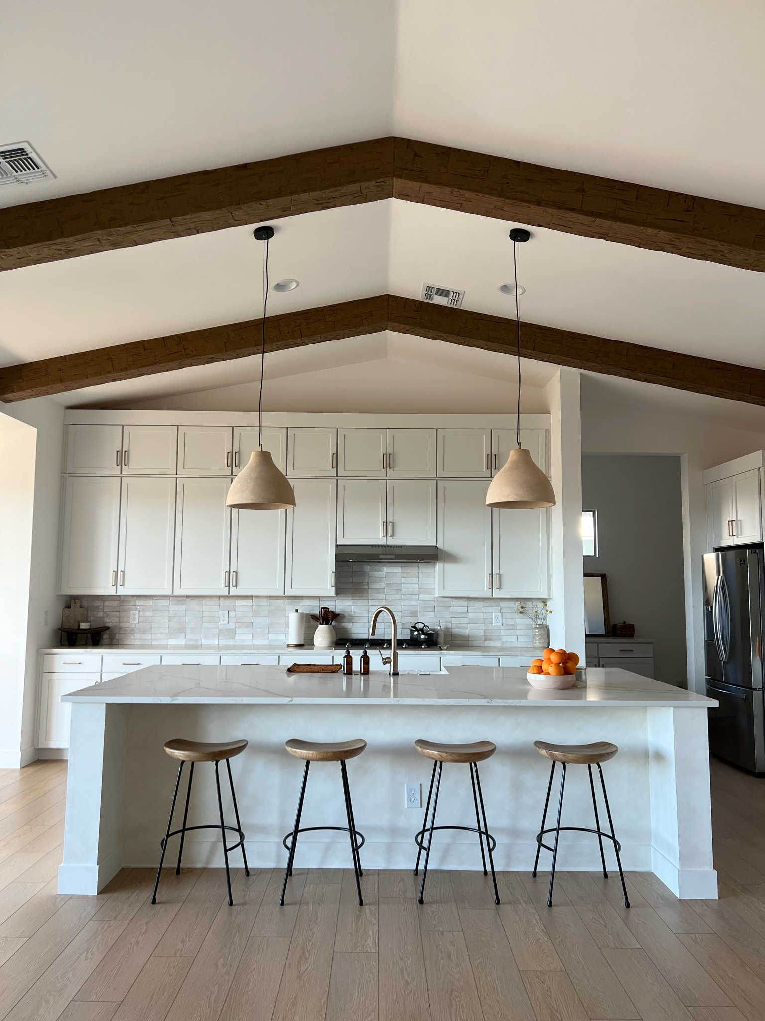 Kitchen links. Our island lights are from shades of light and originally came in a grey concrete color (linked a similar one from their website). I lime washed them to this terracotta color.

#LTKhome