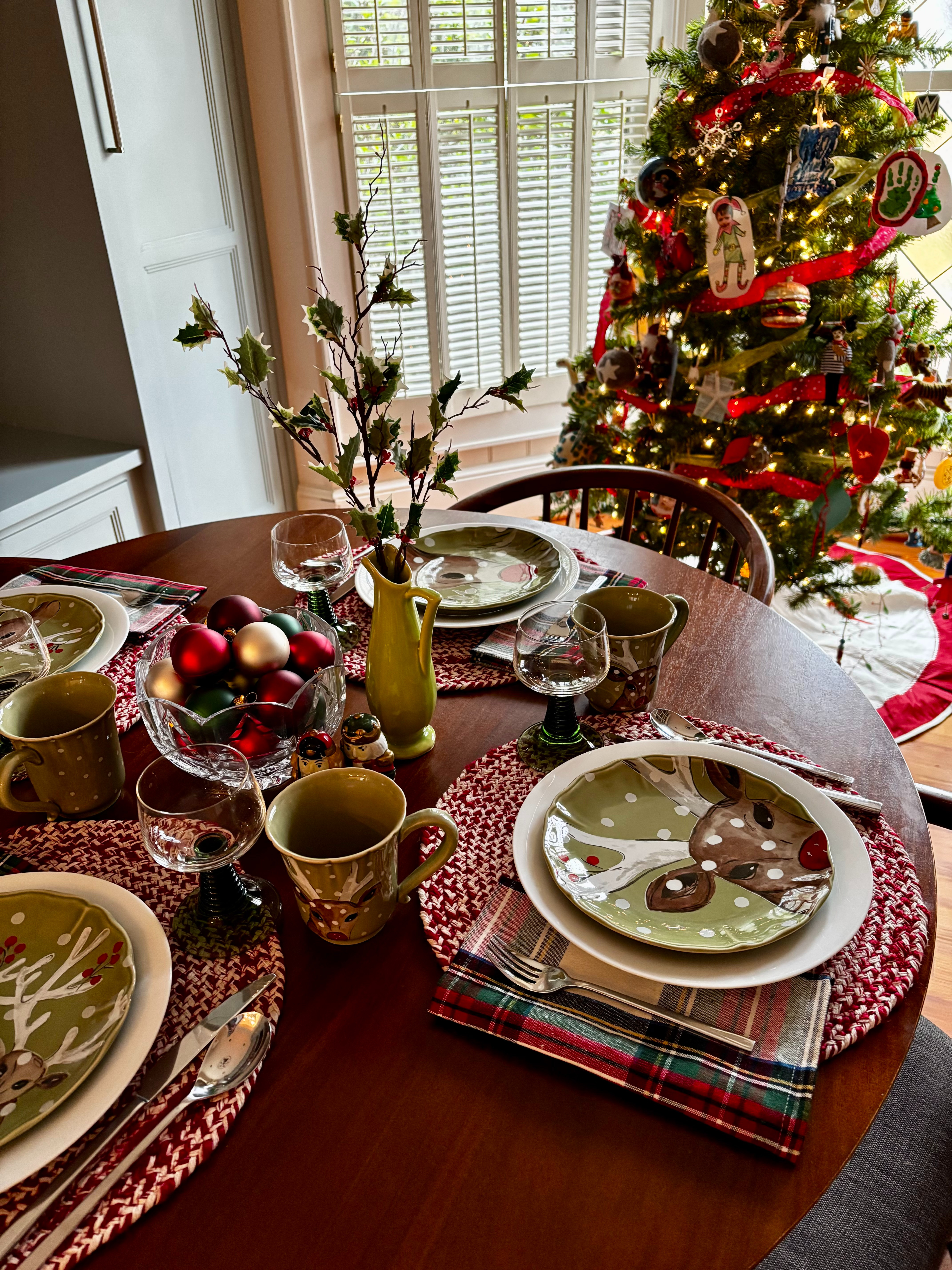 Alex’s breakfast room is all things merry & whimsical! 🎄🦌✨ These playful reindeer plates steal the show, paired with cozy textures and classic Christmas touches. Shop this cheerful tablescape to bring a little holiday magic to your morning moments! #ChristmasTablescape
 

 