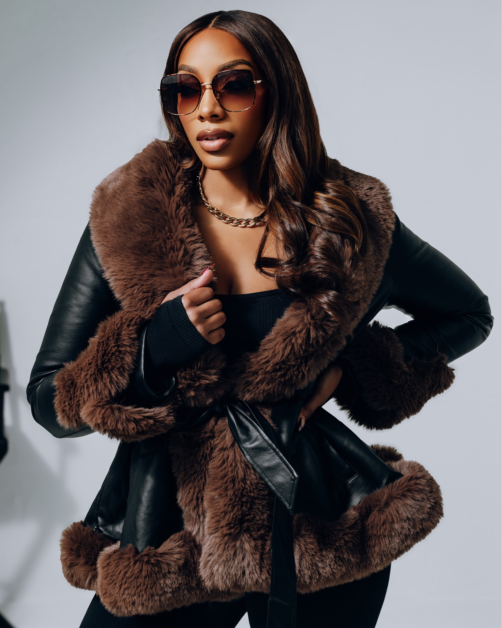 I love styling a jumpsuit! Level up your winter vibes with the KENZY Fur Trim Peplum Moto Jacket in Black/Brown from Shop AKIRA, styled with a sleek black jumpsuit and a bold chain link necklace. Luxe layers, endless glam. ✨ I can wear this jacket with so much! #ShopAKIRA #WinterChic #LTKStyle