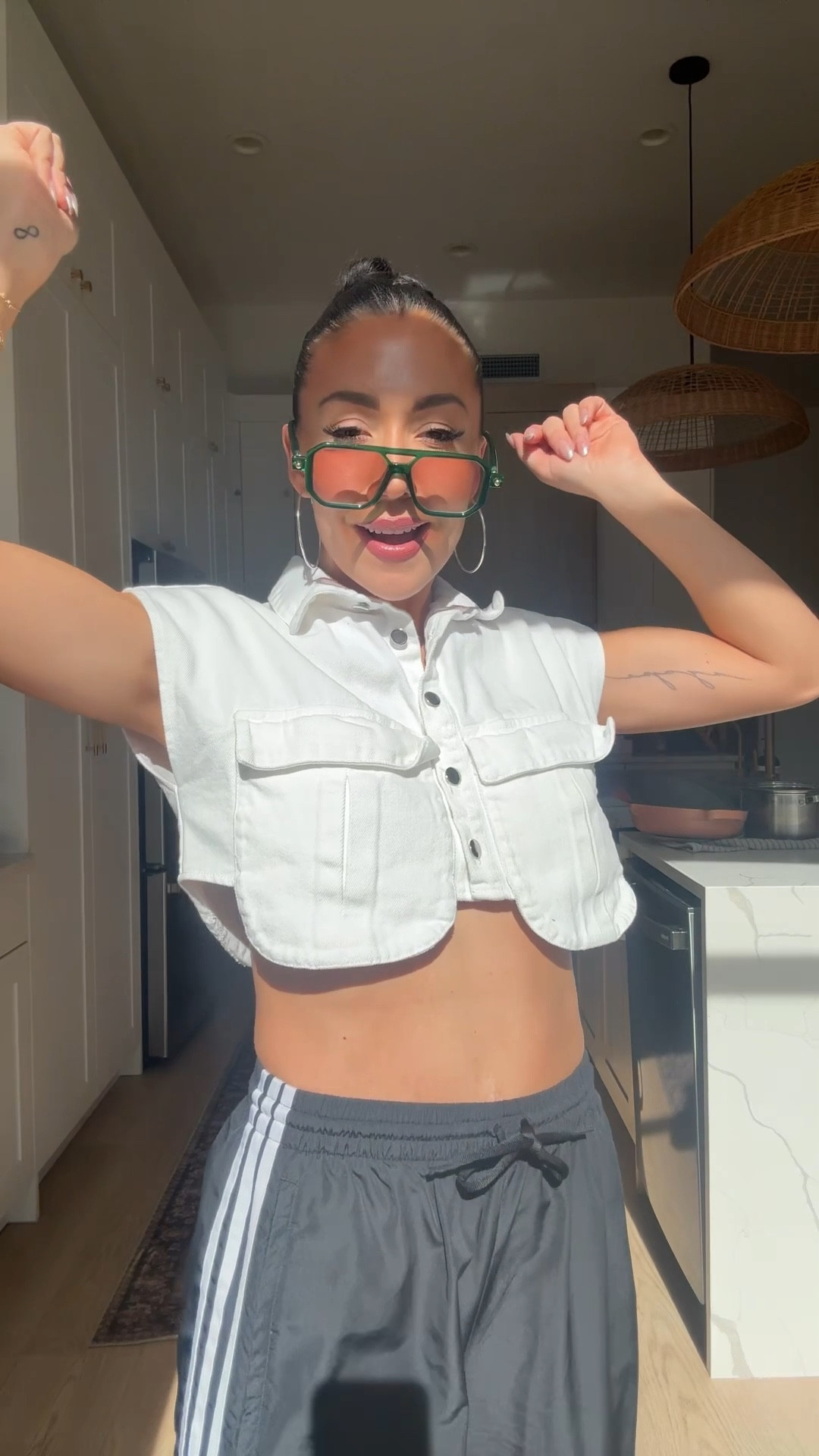 Hello…it’s me again 🫱🏽‍🫲🏾😝 sharing my outfit in this video!
Amazon denim crop top size small
Adidas wide leg track wind pants size XS 
Amazon sunglasses 


#LTKFindsUnder50 #LTKootd #LTKSeasonal