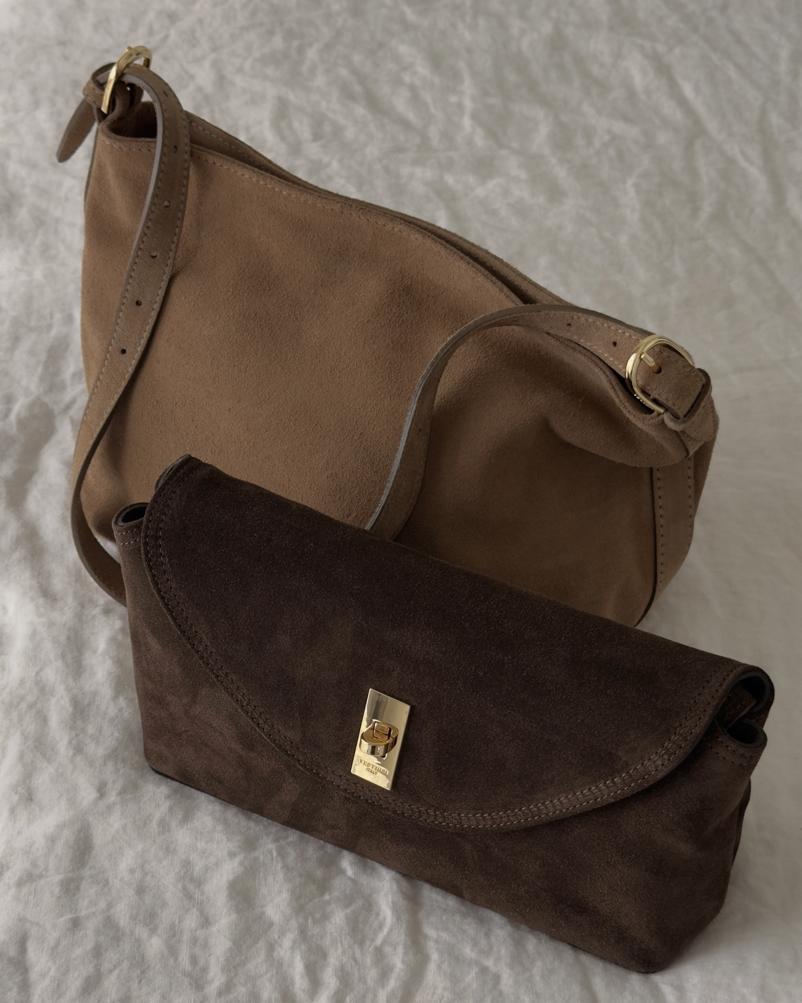Merci Vestirsi! 

2 of my new favorite suede bags that I can’t wait to style on repeat! 🤎

#gifted #suedepurse #handbags 

#LTKgrwm #LTKootd #LTKSeasonal
