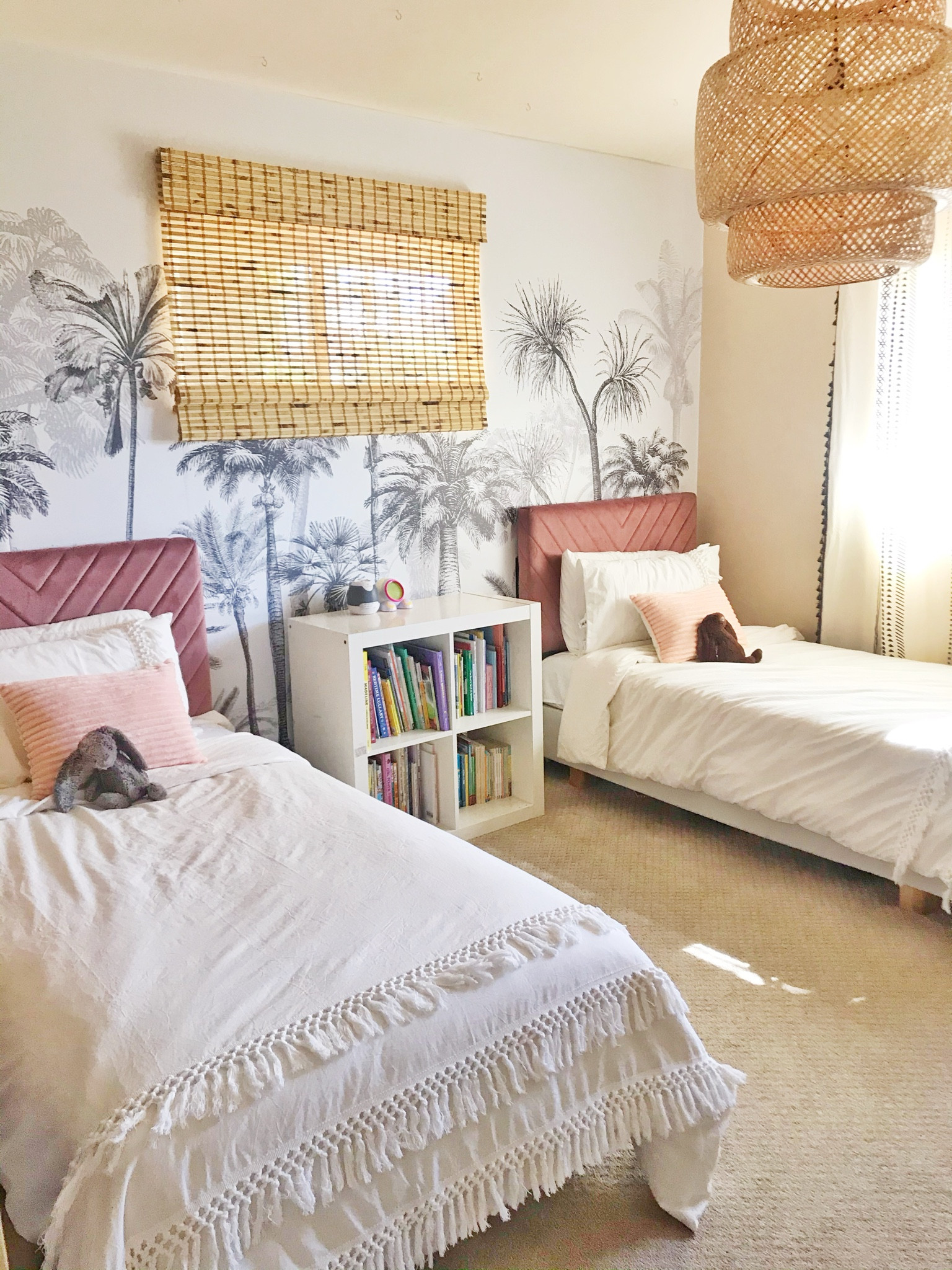 Kids room design- how do you design a kids room that is fun and whimsical but doesn’t look like a theme vomited in one room of your house??  A mural is a great way to add some whimsy.  Also colors that fit im with your overall palette help- here I went with a dusty rose headboard instead of a brighter hue.  

#LTKhome #LTKstyletip #LTKkids