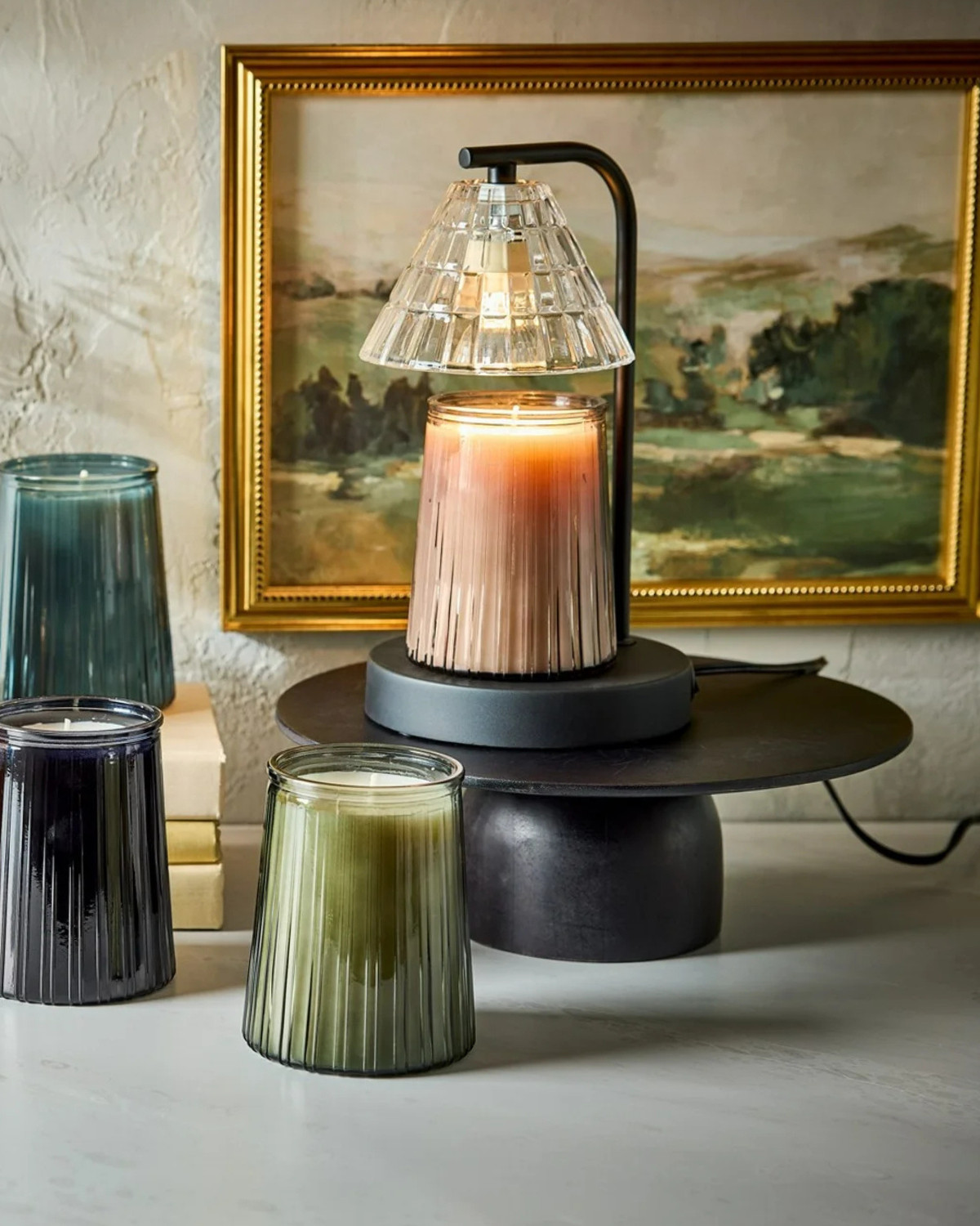 $10 candle warmer lamp + $5 candles!  

 