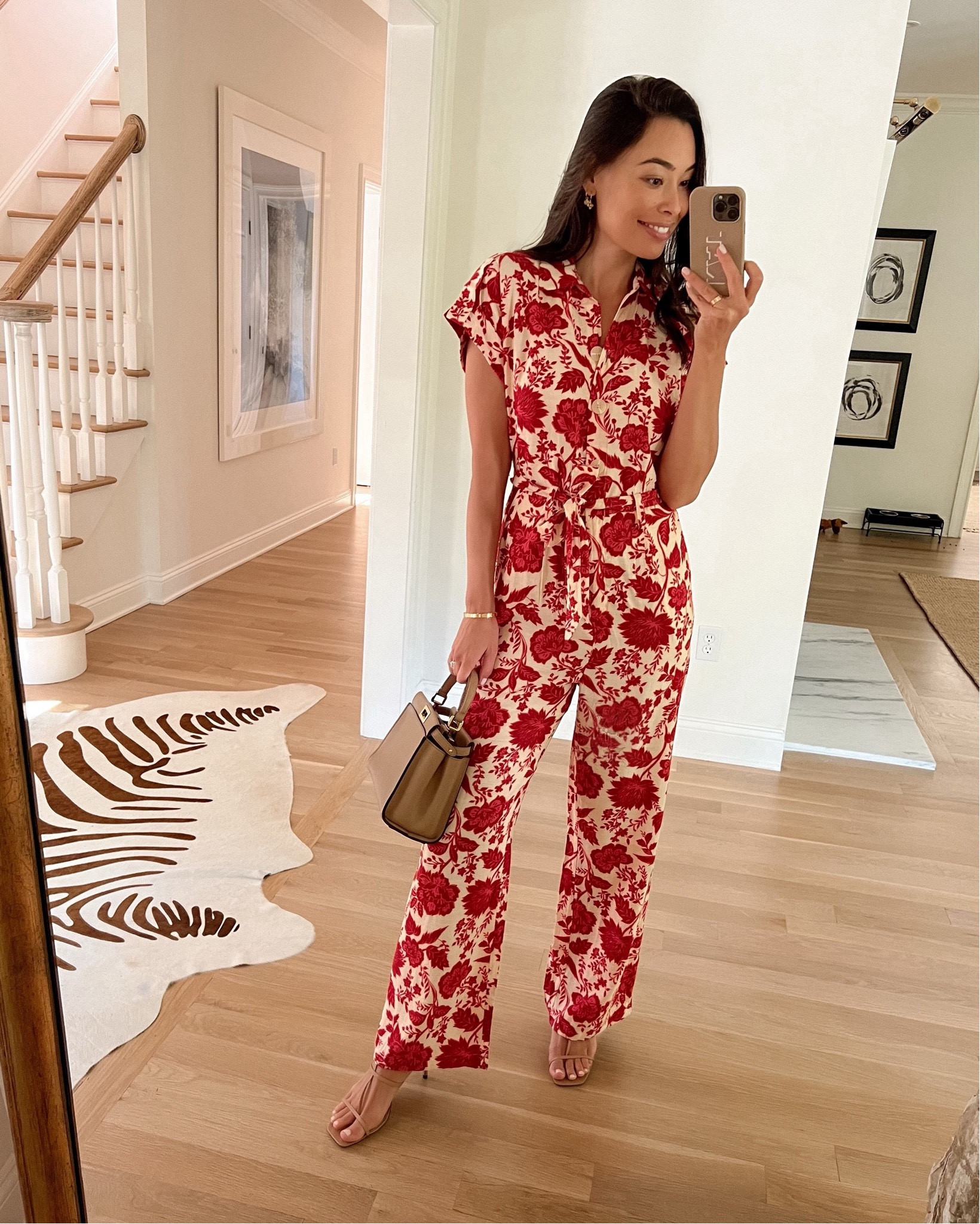 Kat Jamieson wears a red floral jumpsuit. Summer outfit, sandals, Fendi bag. 

#LTKParties #LTKSeasonal #LTKItBag