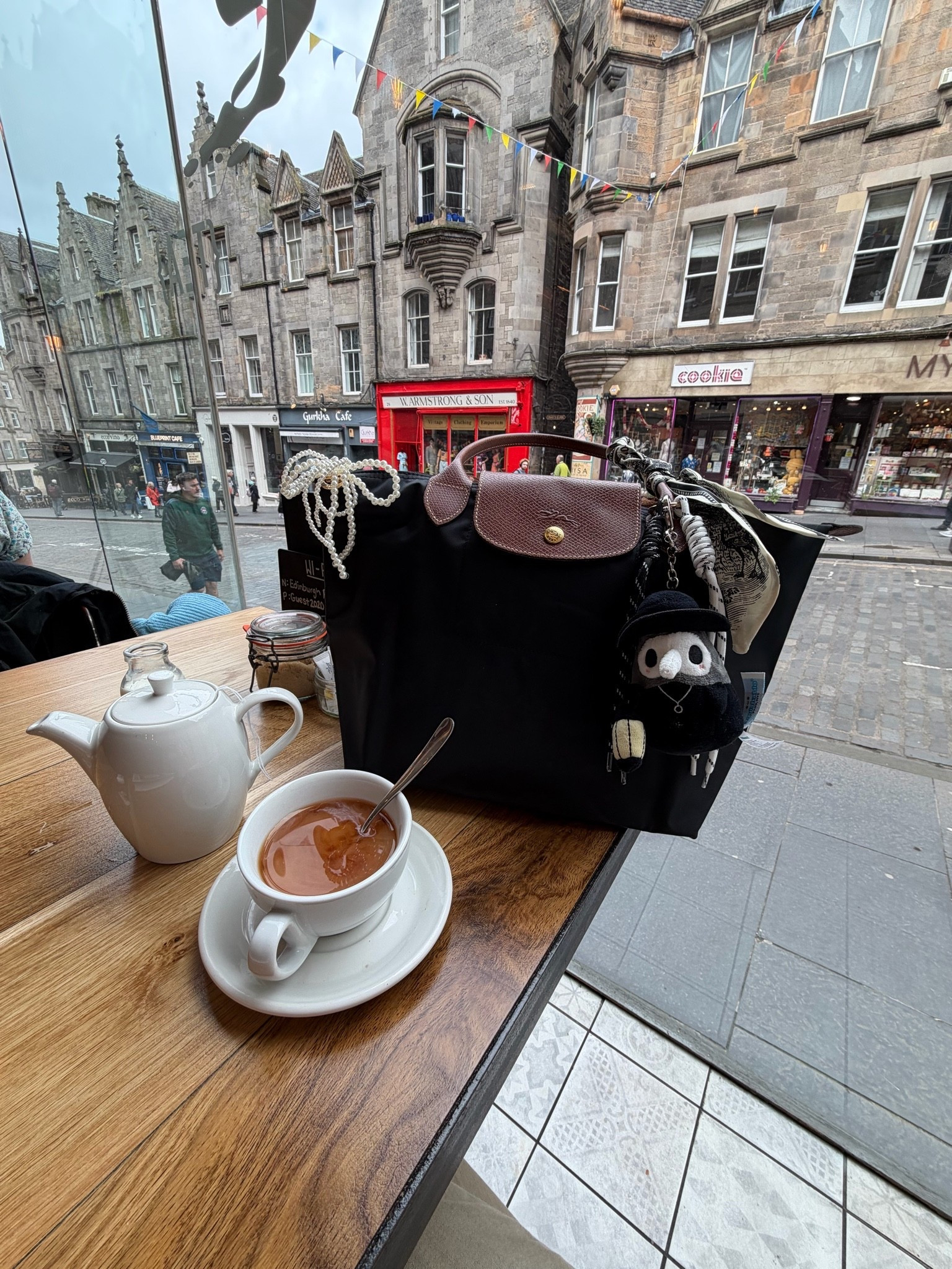 Bag of the day in Edinburgh 
Black Longchamp Le Pliage medium
Had to bring it it he plague doctor bag charm 🖤
