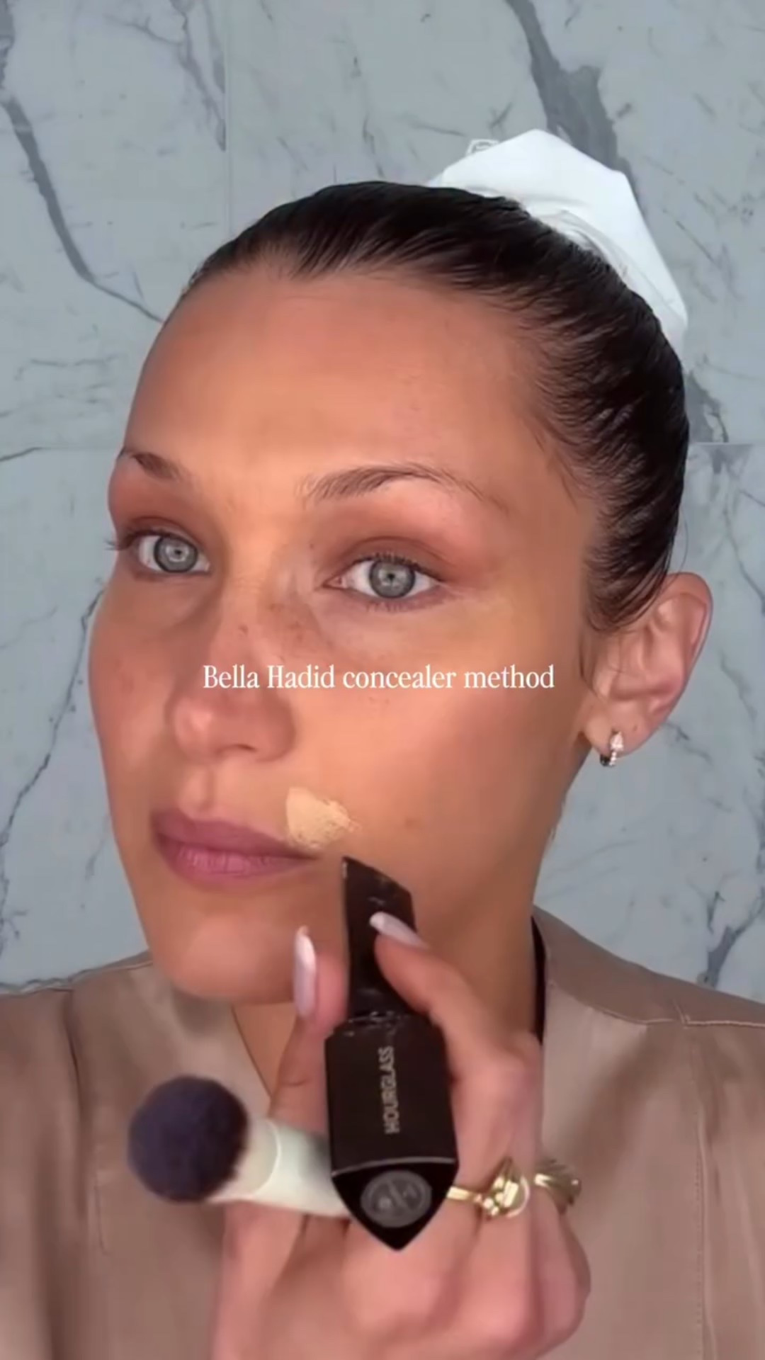 Trying Bella Hadid’s exact concealer method. I’m using the @merit Minimalist Perfecting Complexion Stick in shade Sandstone & Bella uses the @hourglasscosmetics Vanish Seamless Finish Foundation Stick🤍

#makeup #makeuptutorial #bellahadid #concealertutorial #voguebeauty