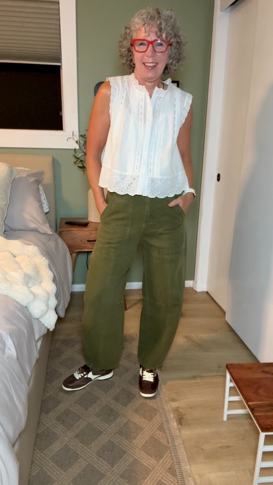 I linked what I could or a similar options
Small tank top 
Tts pants 
Tts sneakers 
Small robe 
Bag and jacket are older