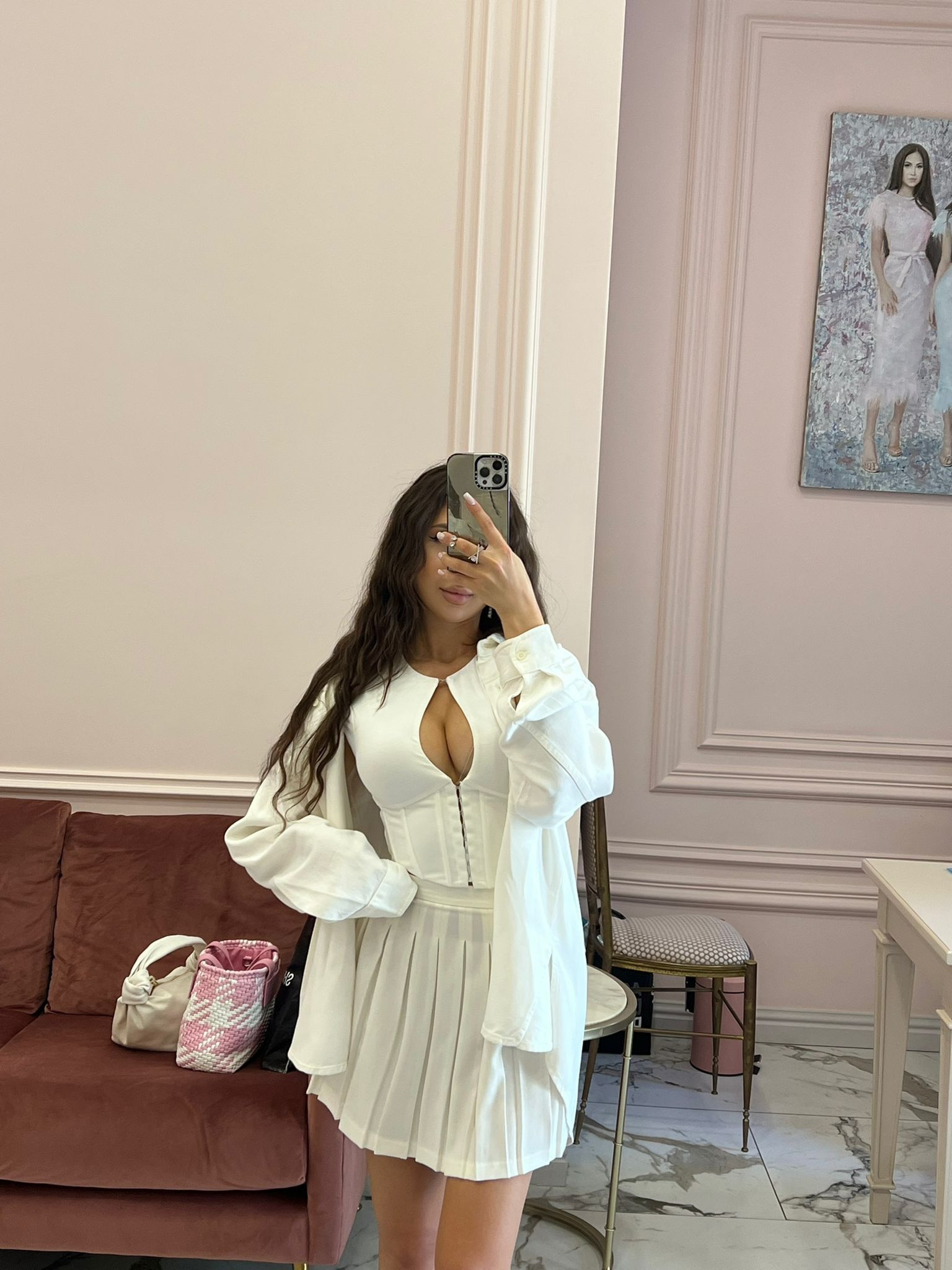 White corset top, corset shirt, white oversized shirt, pleated mini skirt, monochrome looks, plt 

#LTKstyletip #LTKSeasonal #LTKeurope