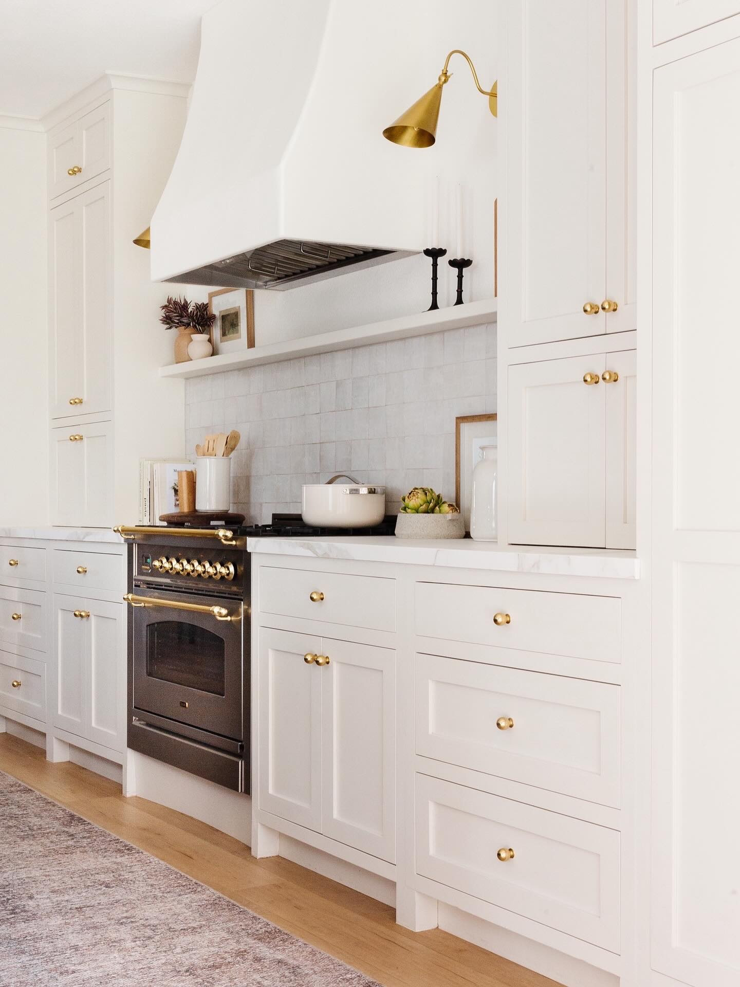Kitchen glow-up, anyone? 🤍 We transformed this builder-grade kitchen into a timeless, layered space with creamy cabinets, brass hardware, and a custom hood. Tap to shop the look—and take our Style Survey to help you define your personal aesthetic and shop with confidence!

#LTKFindsUnder50 #LTKFindsUnder100 #LTKHome