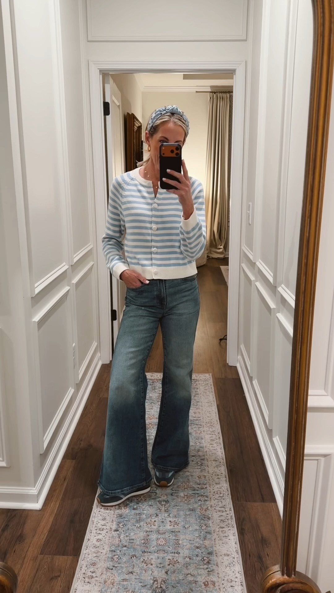 Women’s crewneck cotton cardigan from universal threads is a wardrobe stable but never goes out of style wearing a size small partially unbuttoned for a casual ease paired with my favorite high-rise 70s flare denim from target size small and the sweater size 2 in the jeans

#LTKootd #LTKdayinmylife #LTKgrwm