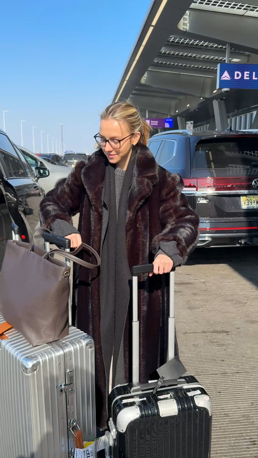 Mastered the art of traveling to cold places with my luggage and coat situation!!! 

#LTKTravel #LTKootd #LTKdayinmylife