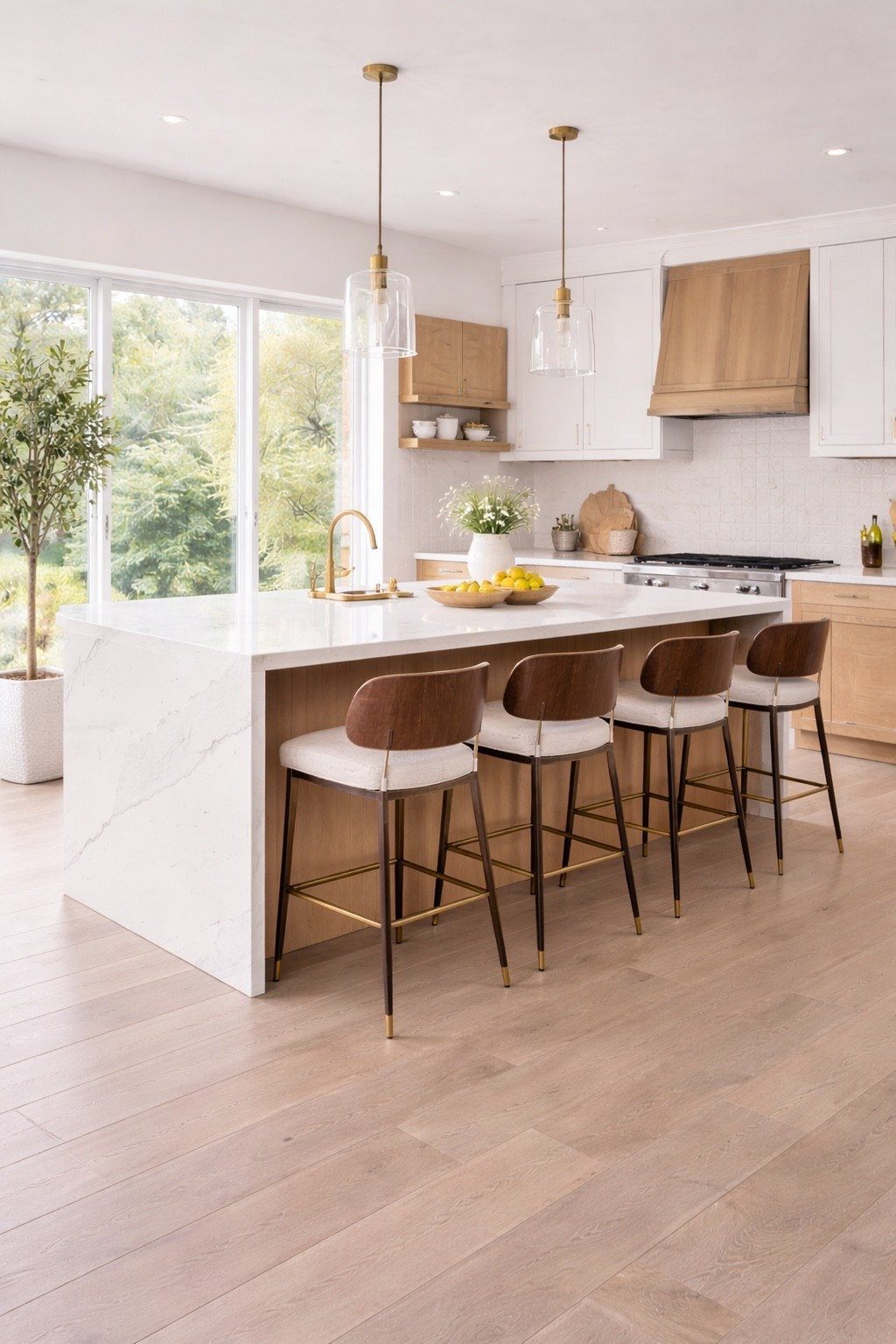 Bright modern kitchen with a clean neutral palette, light wood cabinetry and a functional island with bar stools.
Perfect inspiration for a warm, minimalist kitchen design that feels airy, timeless and elegant.
Ideal for modern homes, open-concept kitchens and neutral interior lovers.

#modernkitchen  
#neutralinterior  
#kitchendesign  
#kitchenisland  
#lightwood  
#minimalhome  
#interiorinspo  
#modernhome  
#scandinavianstyle  
#luxuryinterior

#LTKSeasonal #LTKHome #LTKSaleAlert