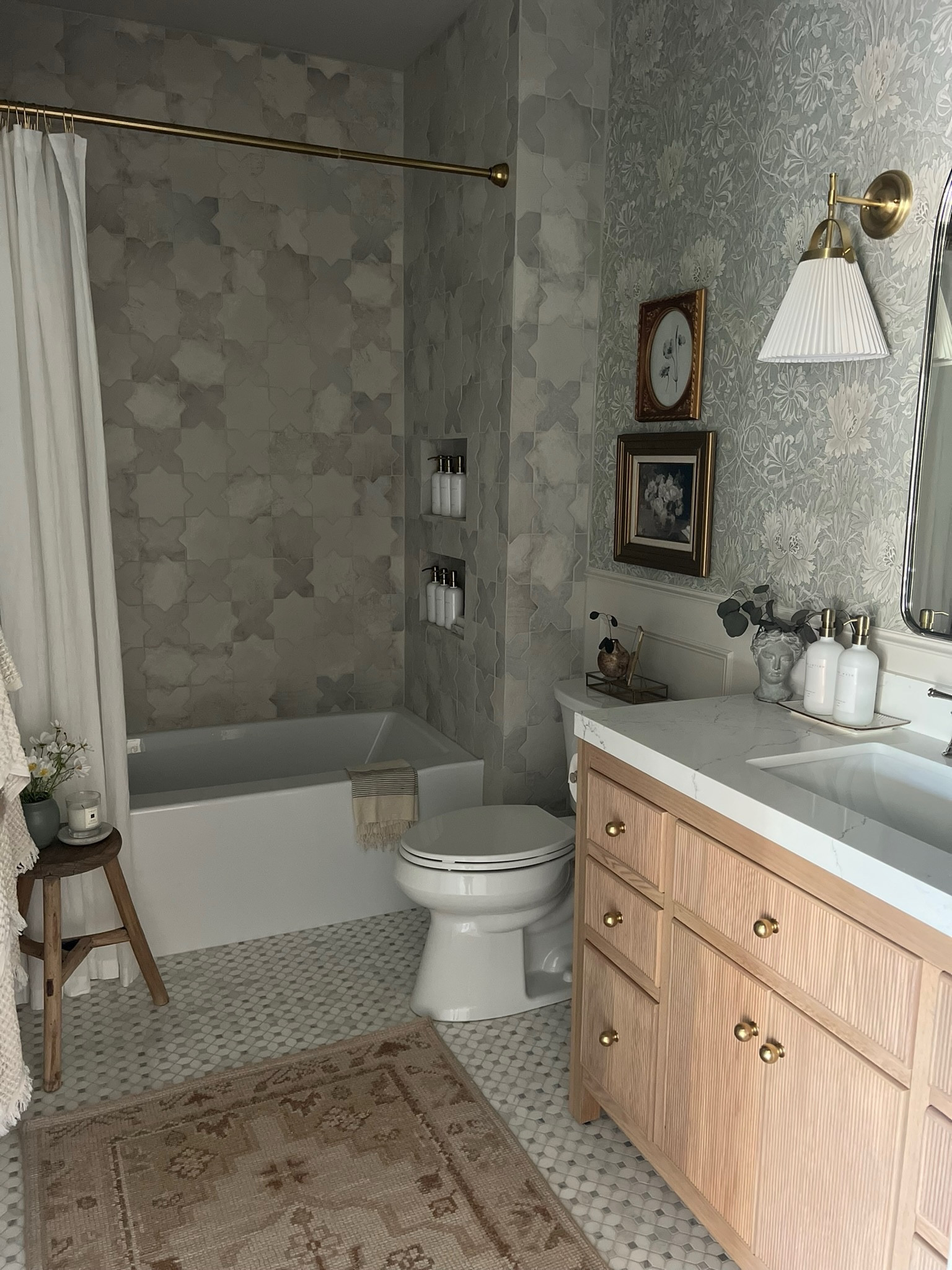 When designing the girls’ bathroom, their wallpaper was one of the very first things I selected! I love the colors, the floral patterns, and how feminine it is. It’s 25% off right too! All of Lulu & Georgia is 25% off sitewide which includes these beautiful sconces too! 

#LTKhome #LTKstyletip #LTKsalealert