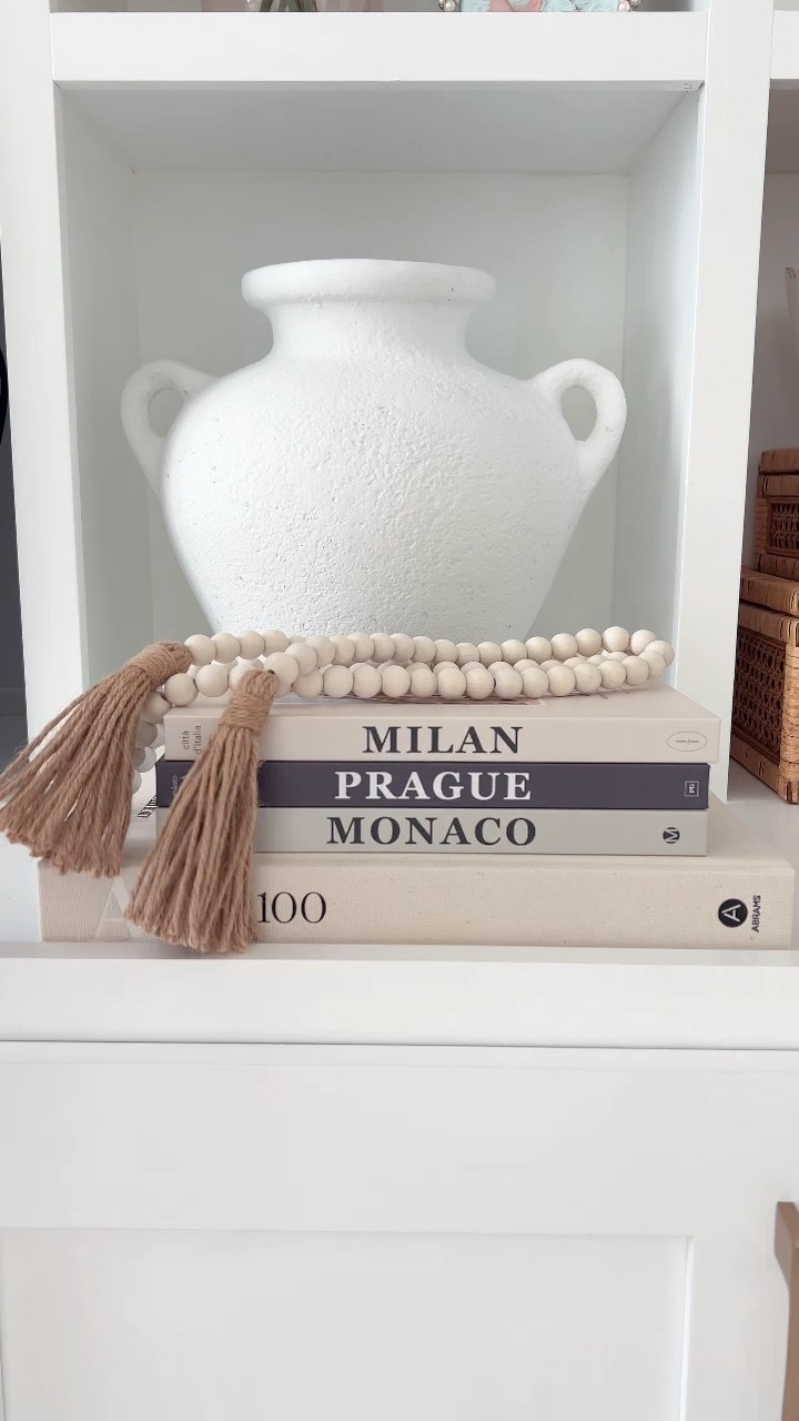 Coffee table styling - love these farmhouse neutral beads to add on top of some books! Under $10 but looks expensive! 

#LTKFindsUnder50 #LTKHome #LTKVideo