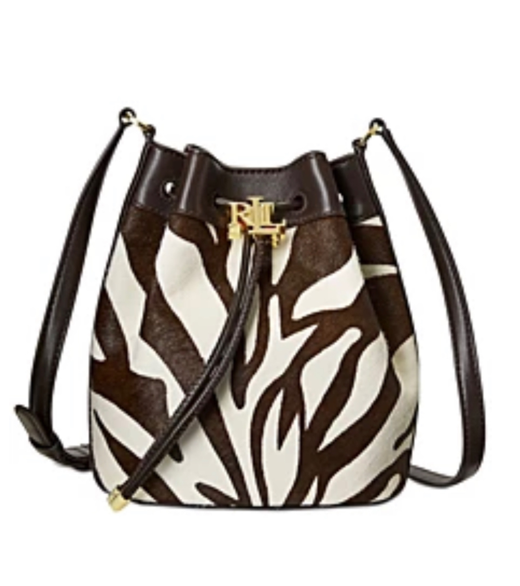 Combining soft calf hair with a zebra motif and supple leather trim, Lauren Ralph Lauren's statement-making Andie drawstring bag provides ample storage for your essentials and features an oversize "LRL" metal stopper for an iconic Lauren Ralph Lauren finish.

#LTKstyletip #LTKitbag #LTKSeasonal