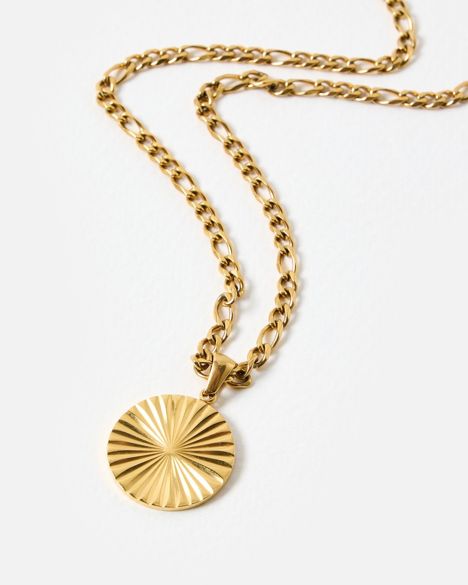 Maya Gold Tone Stainless Steel Waterproof Etched Disc Pendant Necklace | Oliver Bonas | Oliver Bonas (Global)
