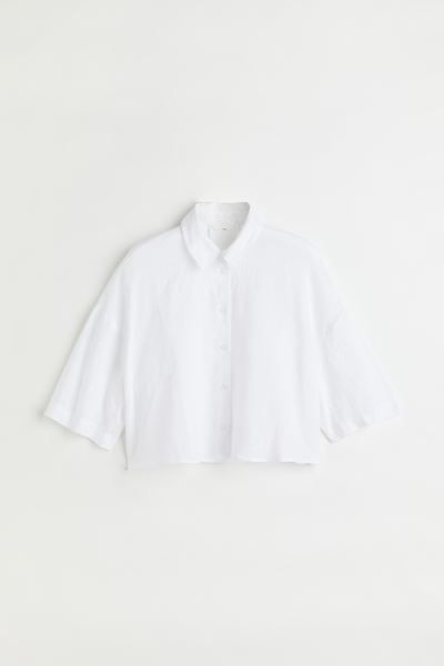 Wide-cut crop shirt in airy linen. Collar, buttons at front, and box pleat at back. Dropped shoul... | H&M (US + CA)