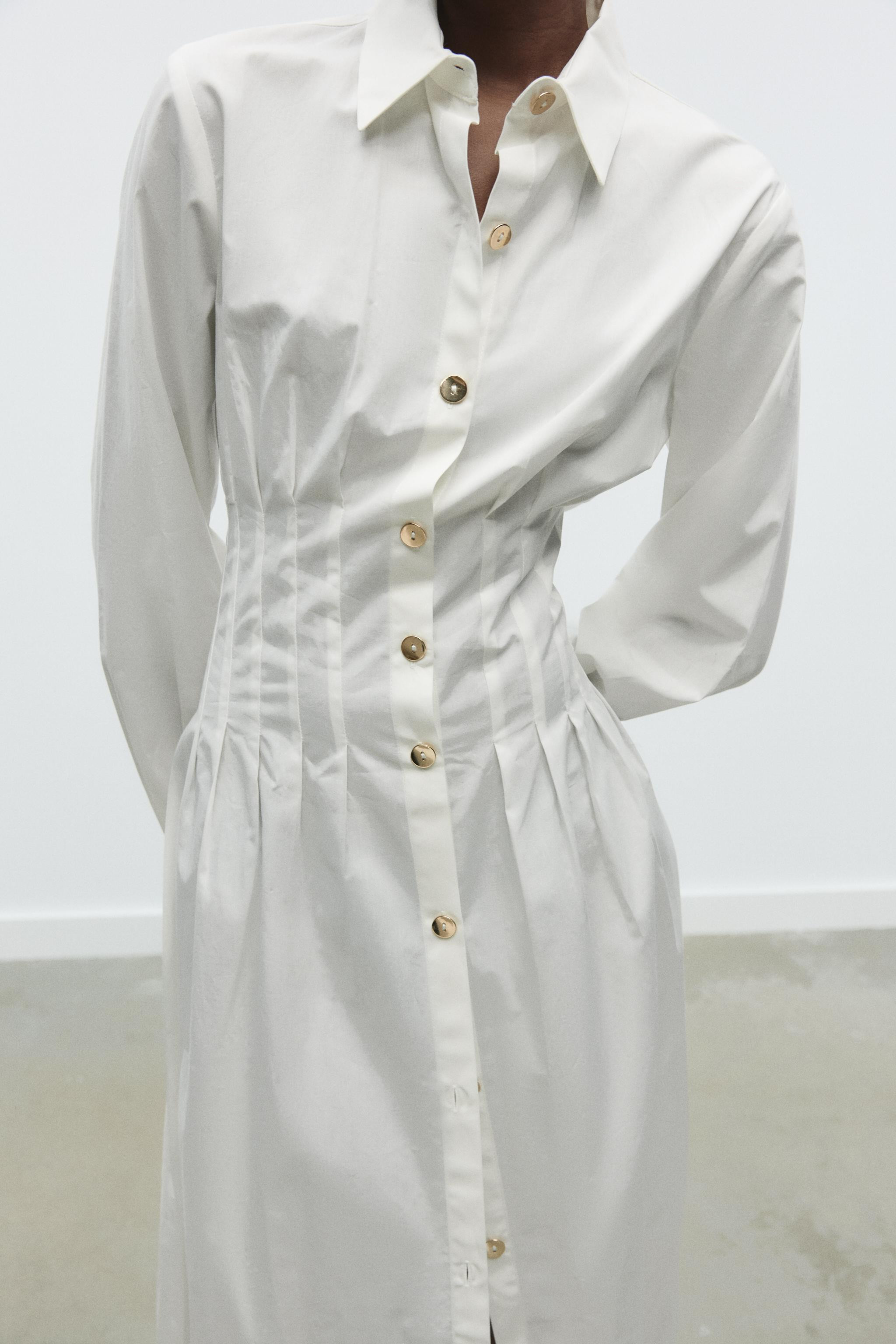 Midi dress with a lapel collar and long sleeves. Fitted waist with pleats. Button fastening at th... | Zara UK