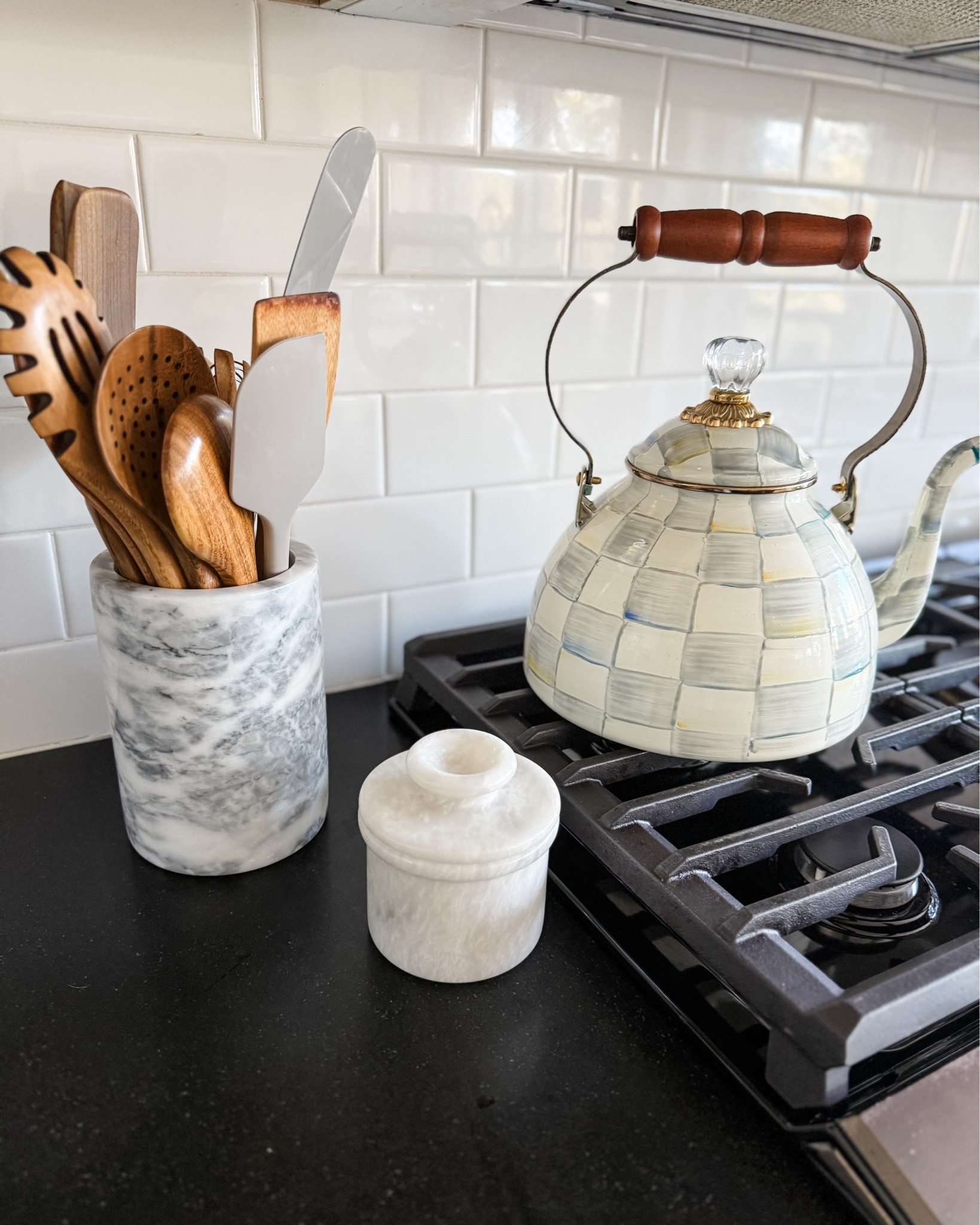 I love that these pieces are useful AND pretty! We replaced all of our plastic utensils with wooden, metal and one silicone piece, added a butter crock and added my very first (but definitely not last) Mackenzie Childs piece!

#kitchen #kitchendecor #homedecor #teapot #giftideas 

#LTKOver40 #LTKHome #LTKFindsUnder50