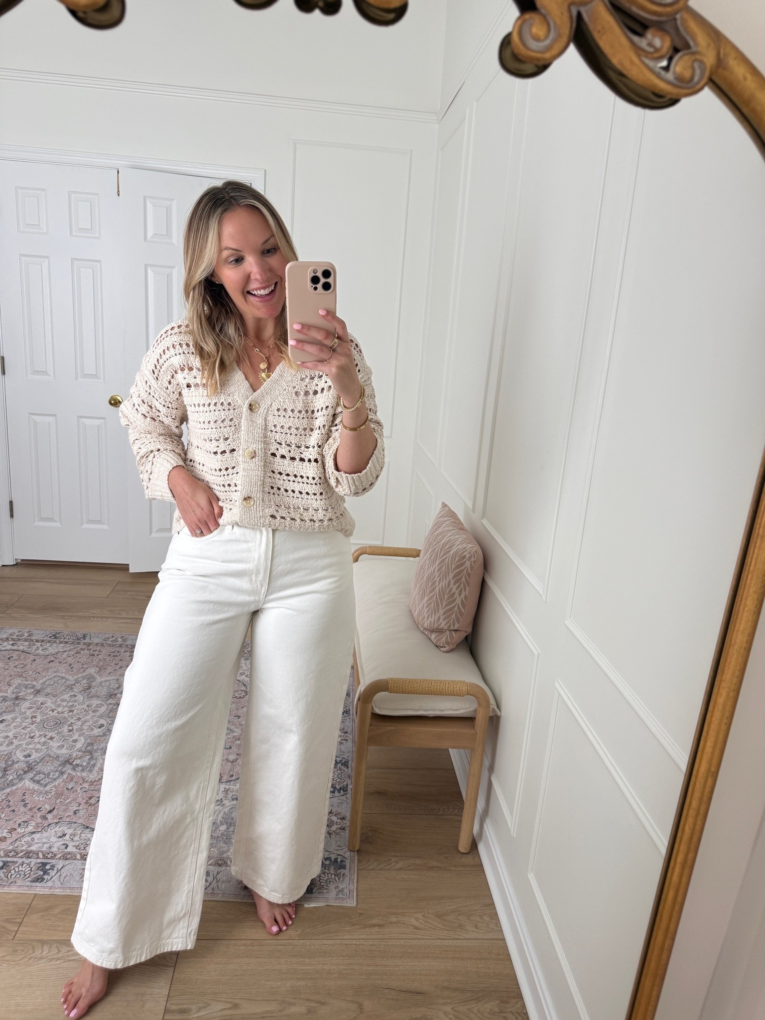 Casual summer outfit - white denim jeans - wearing a med top and size 10/large pants