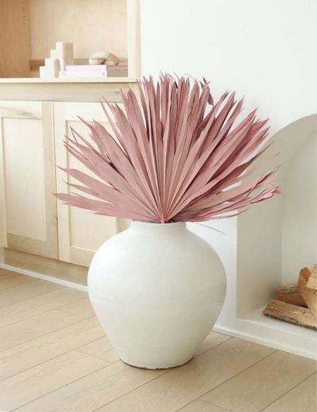 White vase with pink palm leaves! 

#LTKstyletip #LTKsalealert #LTKhome