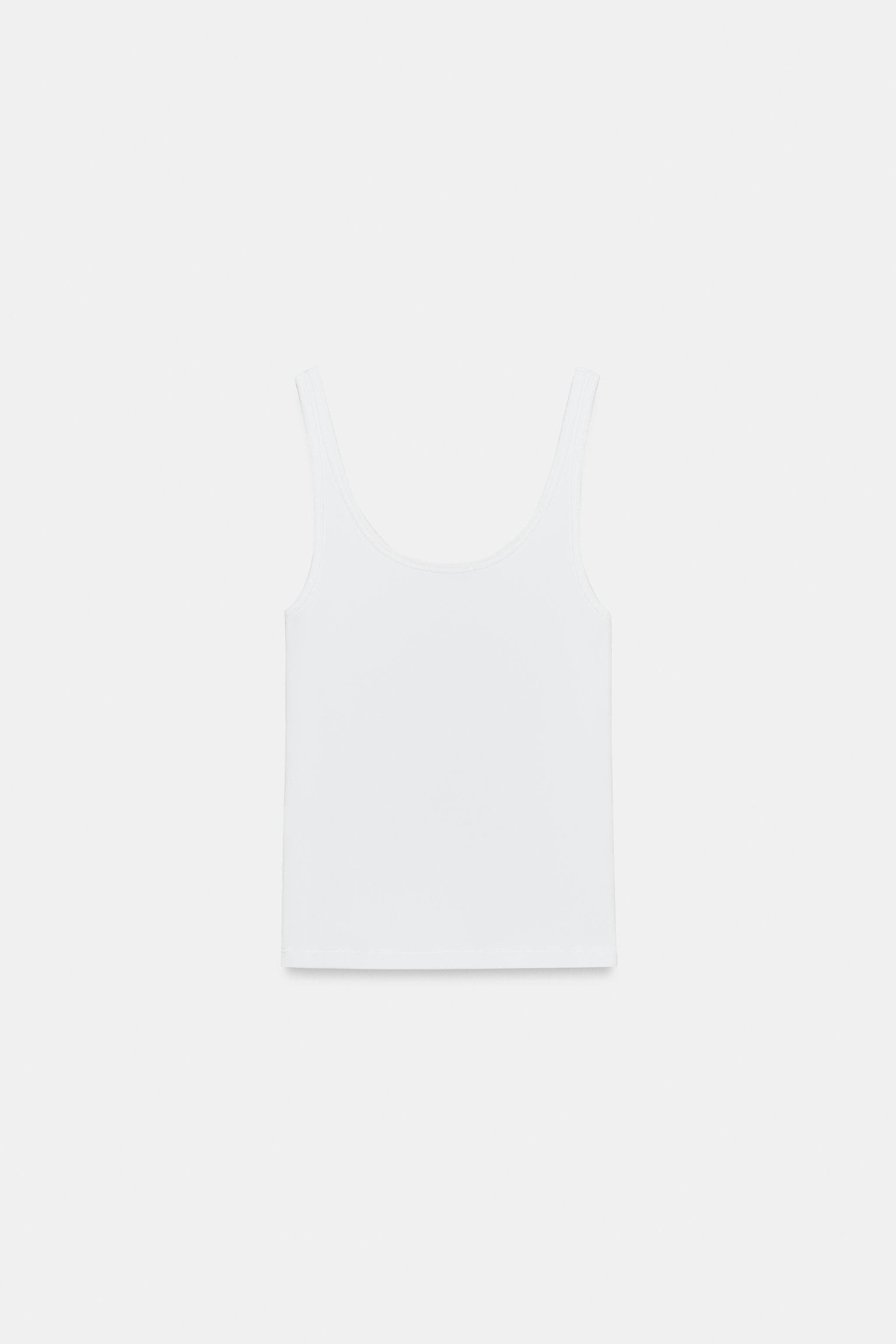 SLIM FIT - ROUND NECKLINE - REGULAR LENGTH - THIN STRAPSVest top made from a lyocell blend yarn. ... | Zara UK