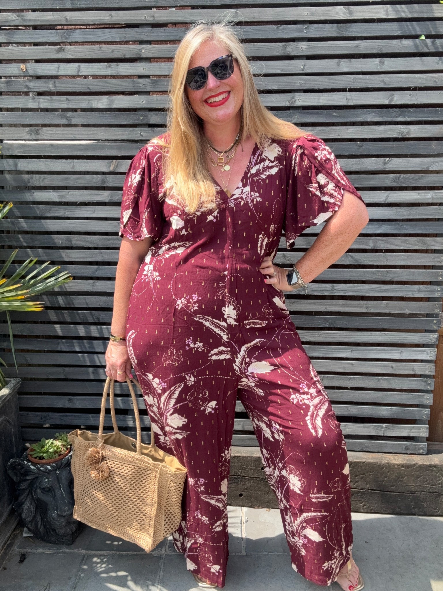 Floral metallic jumpsuit, straw bag, sunglasses 

#LTKcurves #LTKsummer #LTKplussize