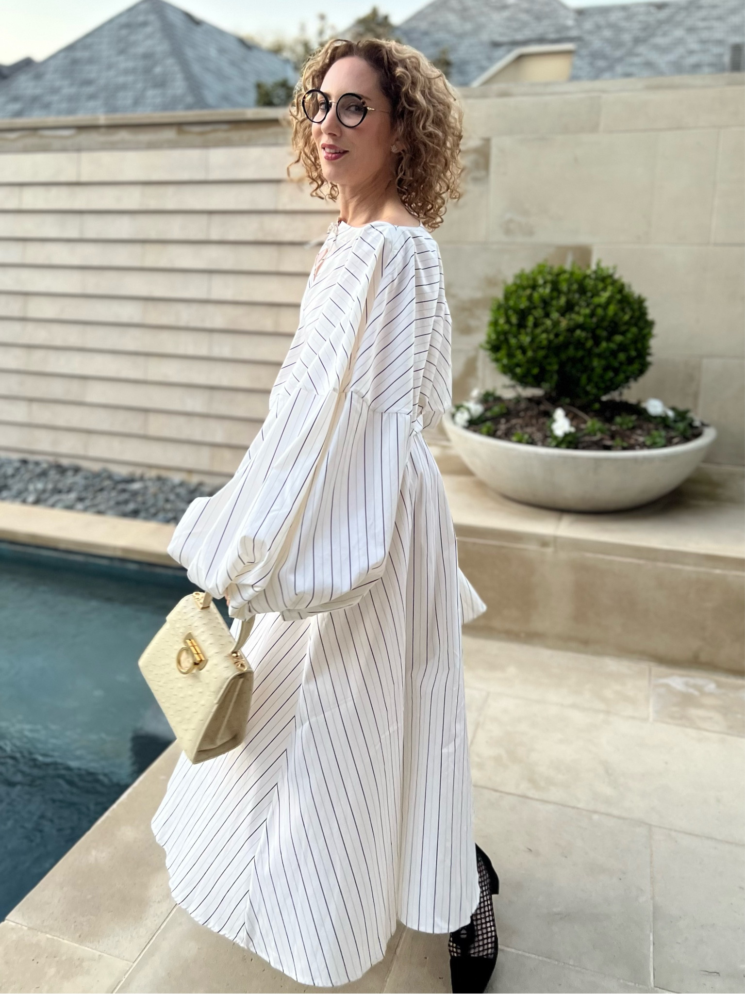 The voluminous sleeves give built-in Remains of the Day movie drama… And I'm a sucker for anything Merchant Ivory ❤️😜❤️
 
Shirtdress: @palmerharding  
Bag: @ferragamo  
Booties: @dior  Glasses: @kaleoscollection

#LTKstyletip #LTKsalealert #LTKFind