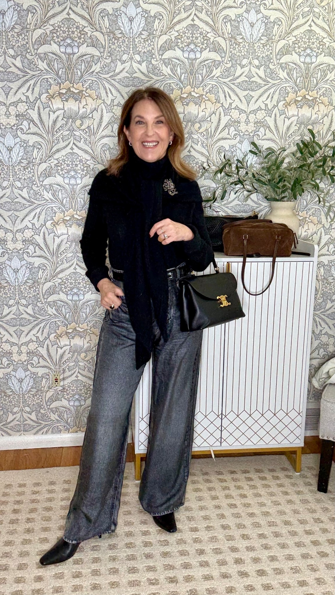 Vintage outfit, but here are similar items.  

Rag & Bone Miramar Jeans
Nordstrom turleneck
Aritzia cashmere triangle scarf
Handbag
Boots
Brooch 

#LTKOver40 #LTKHoliday #LTKPetite