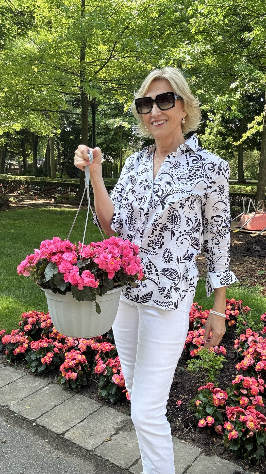A crisp white outfit with a little extra personality 🤍✨ I love how the black pattern on this 3/4 sleeve shirt adds just the right amount of detail, paired with cropped white pants and silver sandals for an easy, elegant look. Simple, timeless, and perfect for those warm summer days 🤍

#LTKSeasonal #LTKOver40 #LTKootd