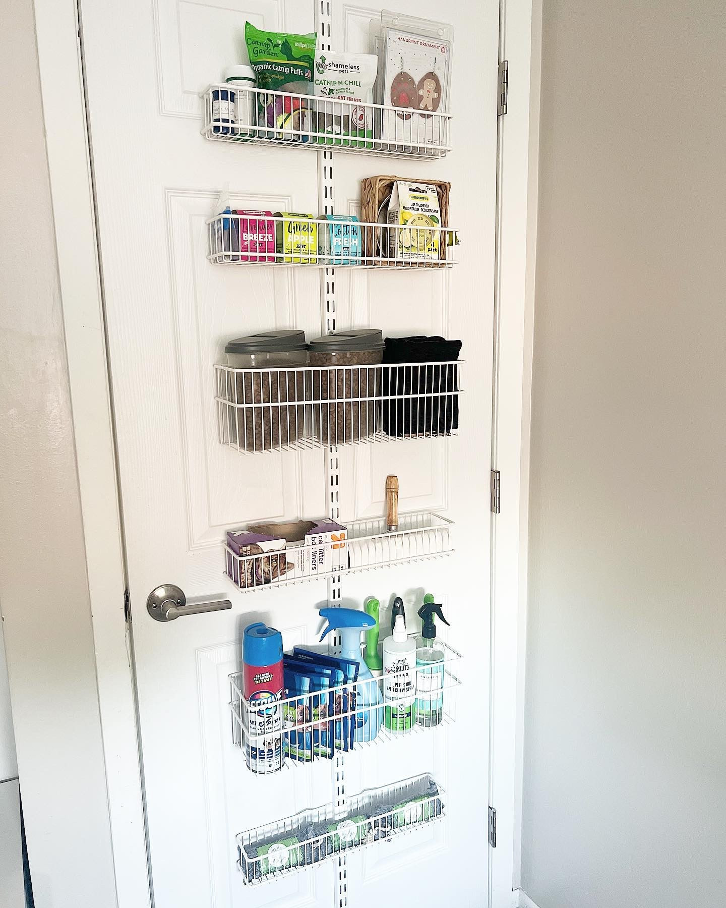 This Container Store Elfa Over The Door narrow rack is my favorite little hidden spot for animals supplies I need often. 

We have 2 cats and 2 dogs (bless my husband’s heart for supporting my crazy love of animals 😂). I love being able to grab this stuff quickly but have it hidden away when the door is open! 🐈🐶

#LTKHome #LTKFamily